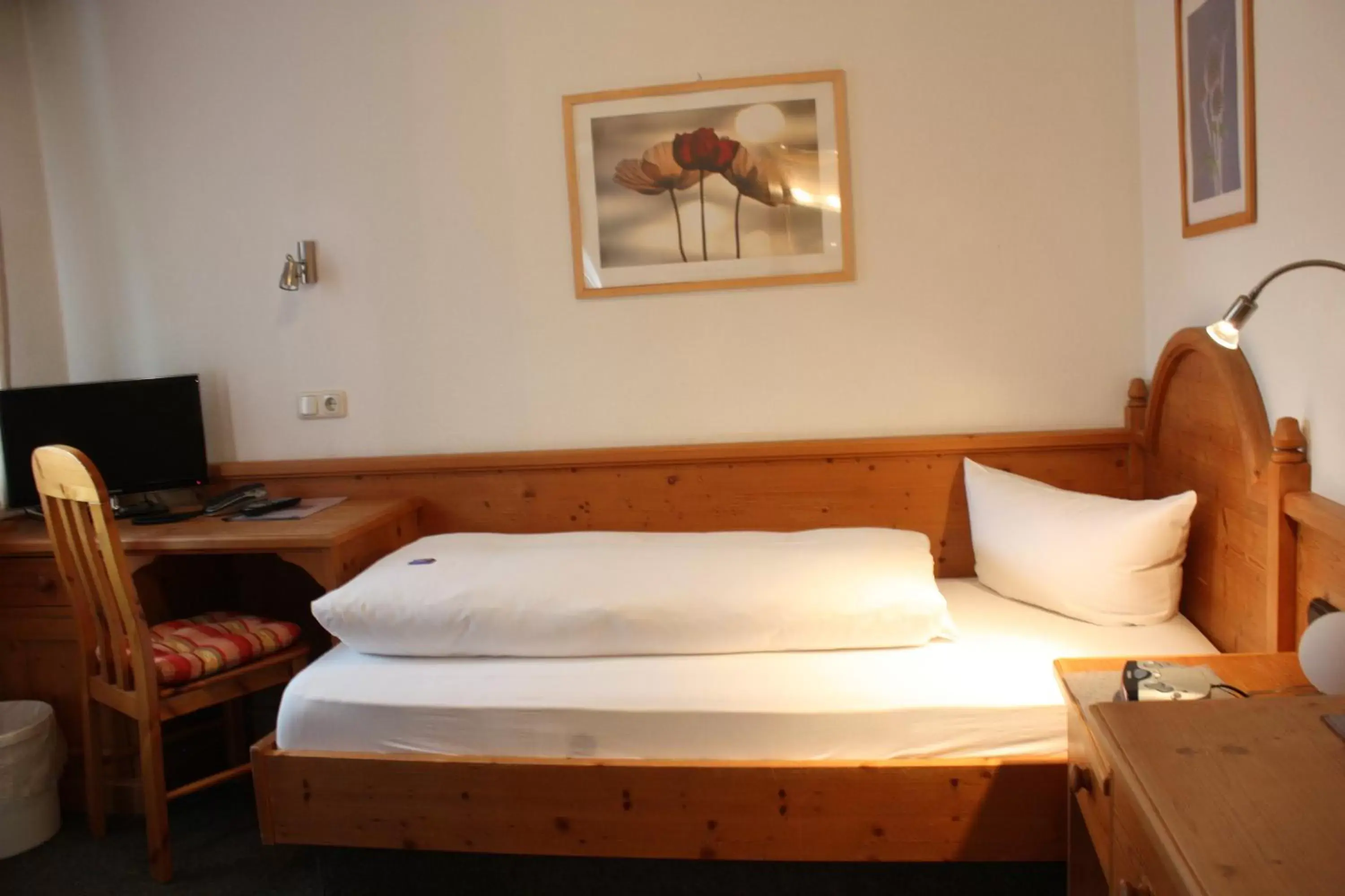 Bed in Das Posch Hotel