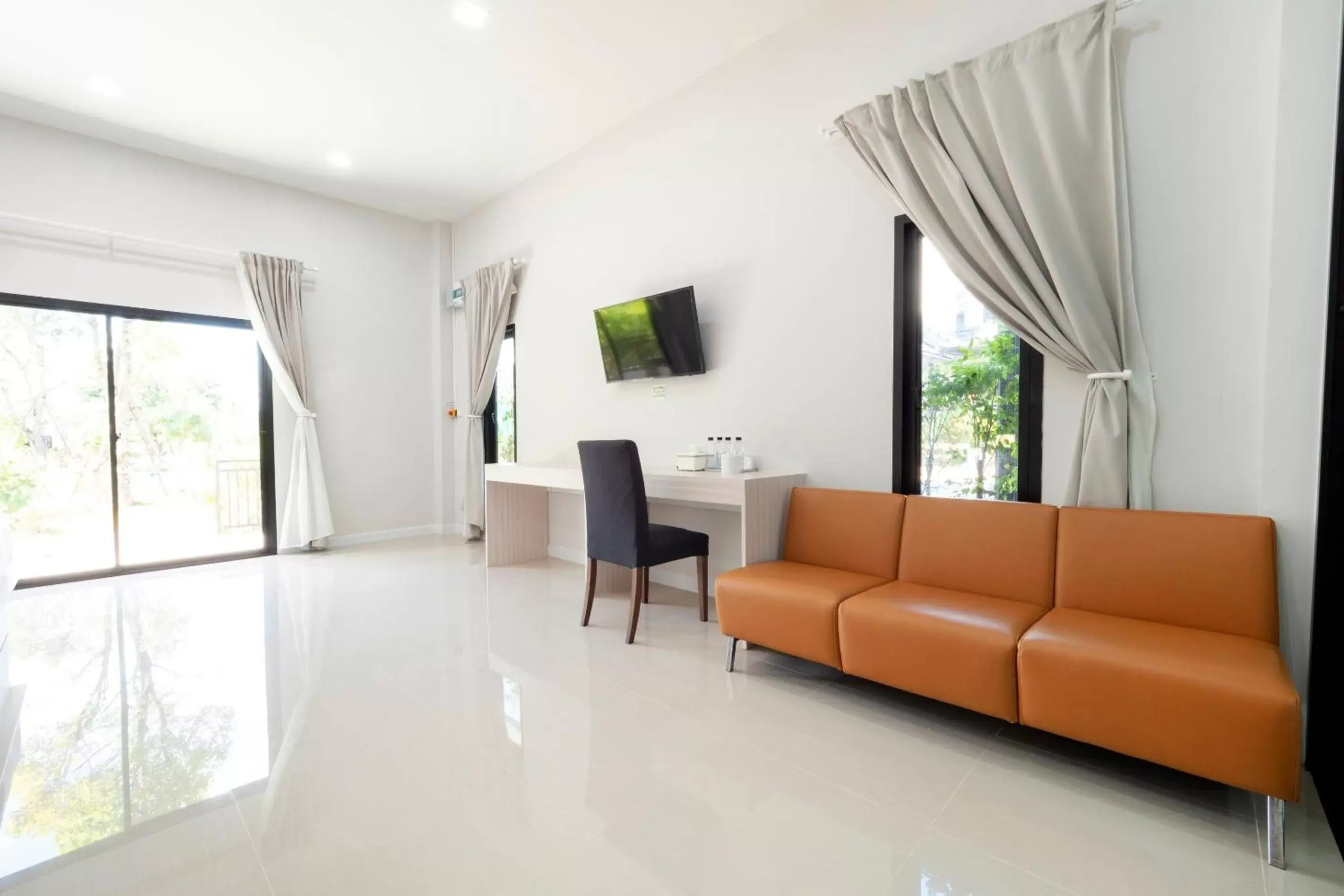 Bedroom, Seating Area in Capital O 75378 Thawapee Resort