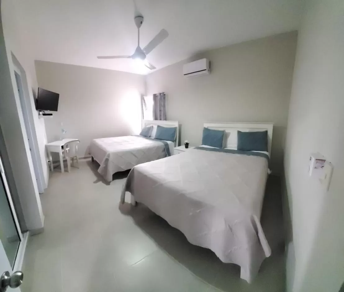 Bed in Apartahotel MACADANA