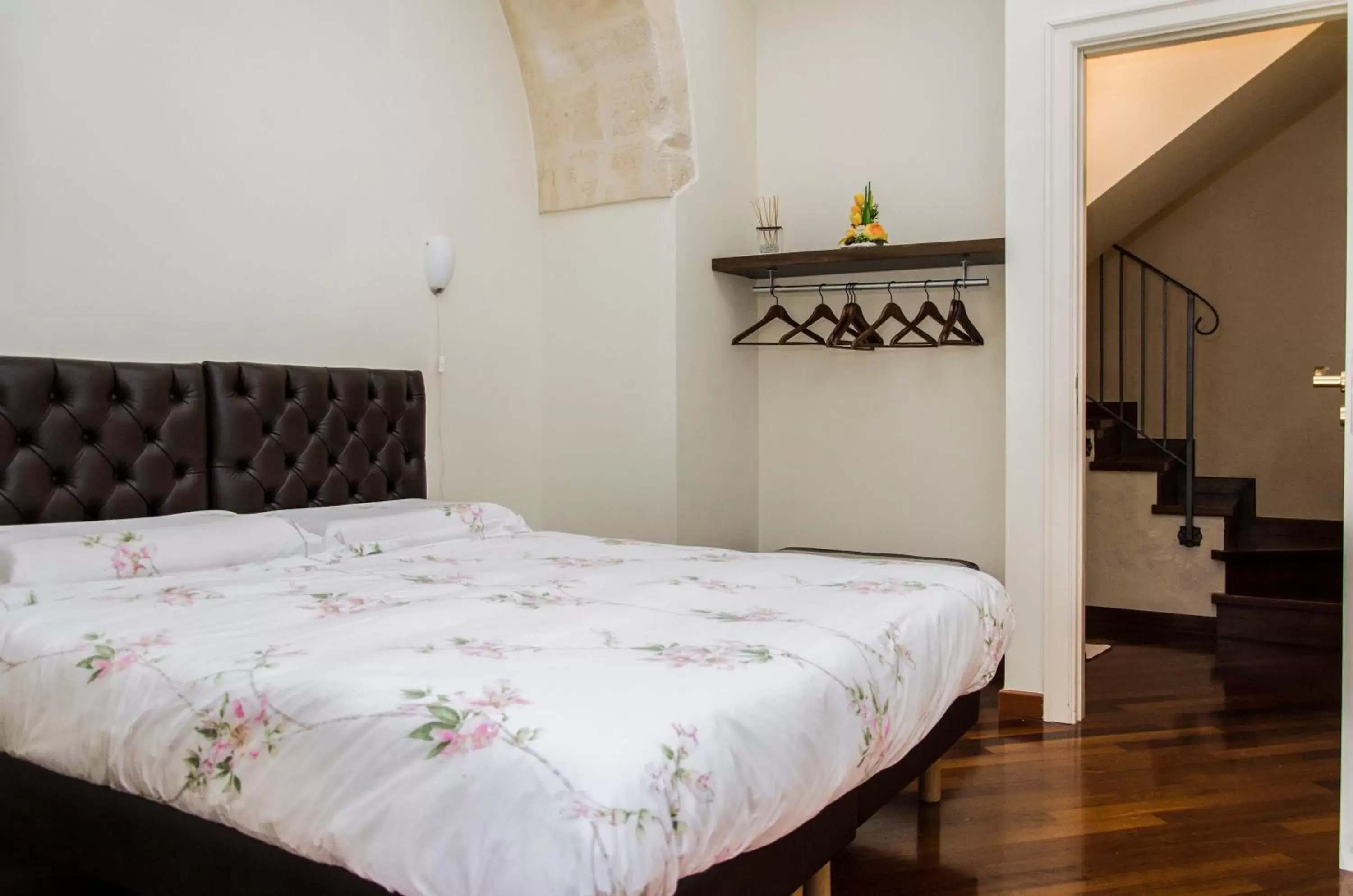 Bed in Alla dimora di Chiara Suite and Rooms