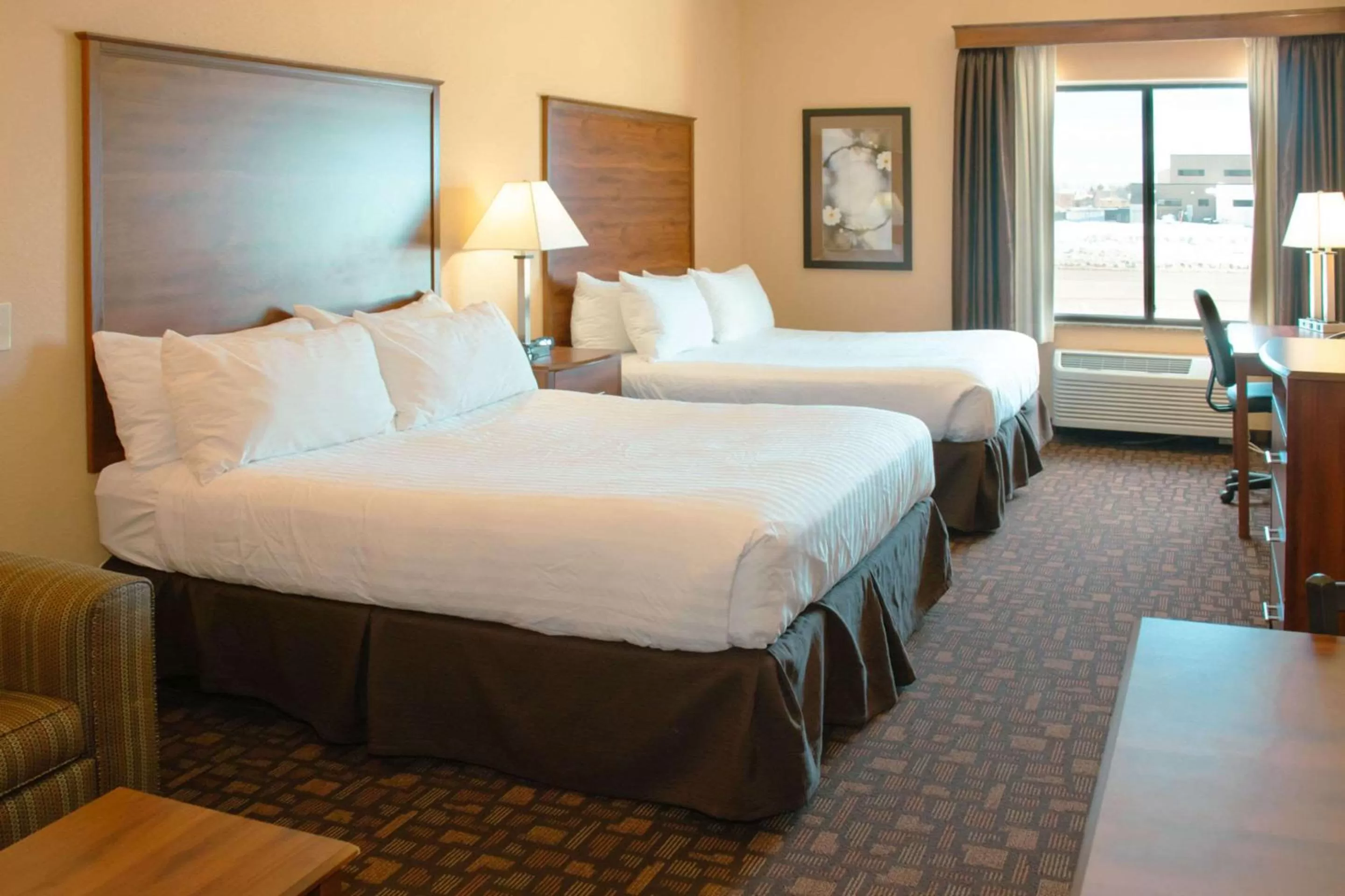 Bedroom, Bed in Expressway Suites of Grand Forks