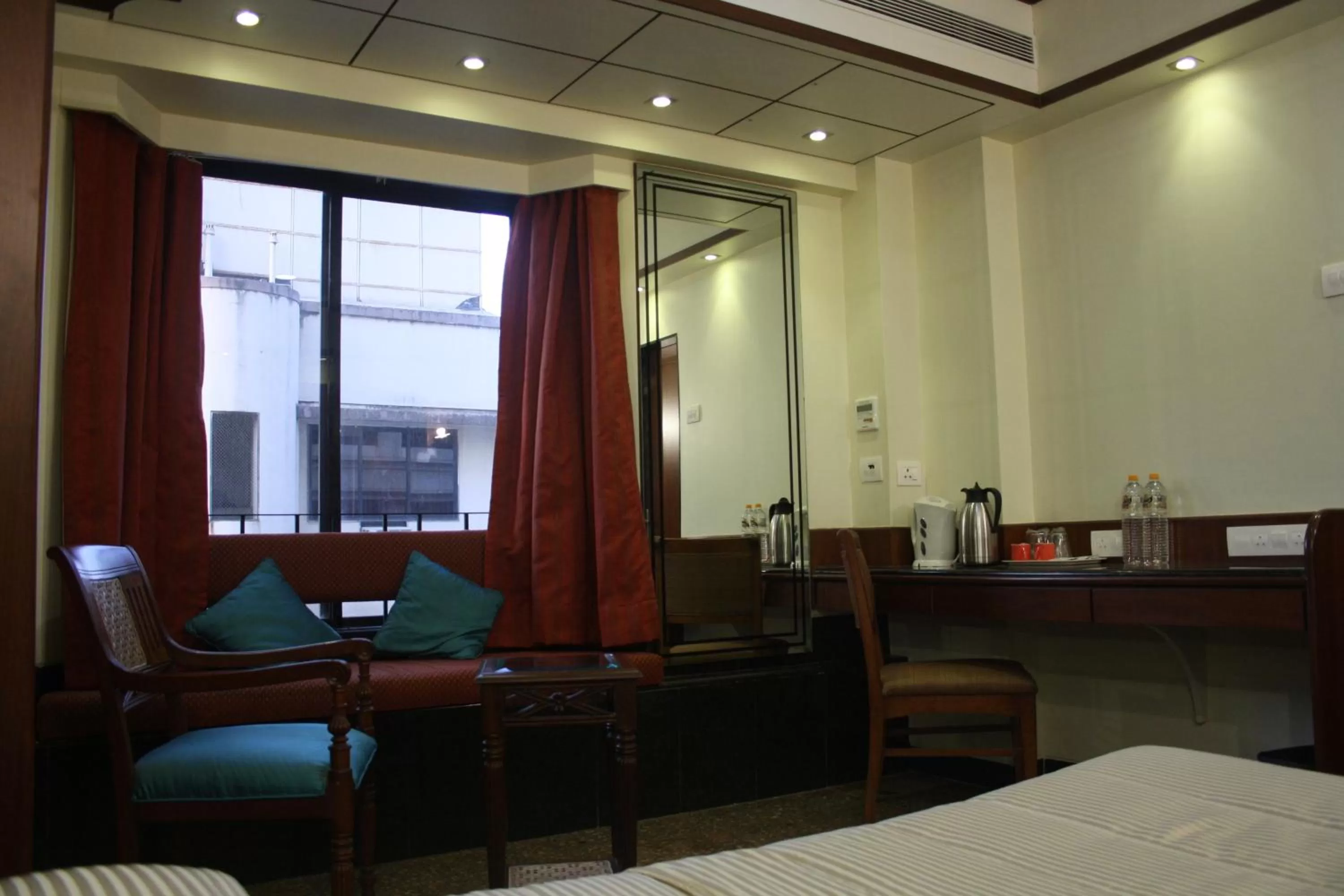 Bed in Hotel Karl Residency