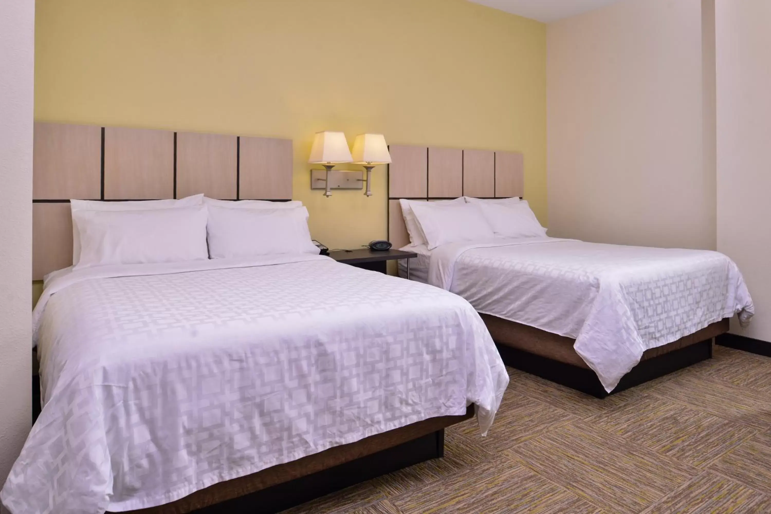 Photo of the whole room, Bed in Candlewood Suites Terre Haute, an IHG Hotel