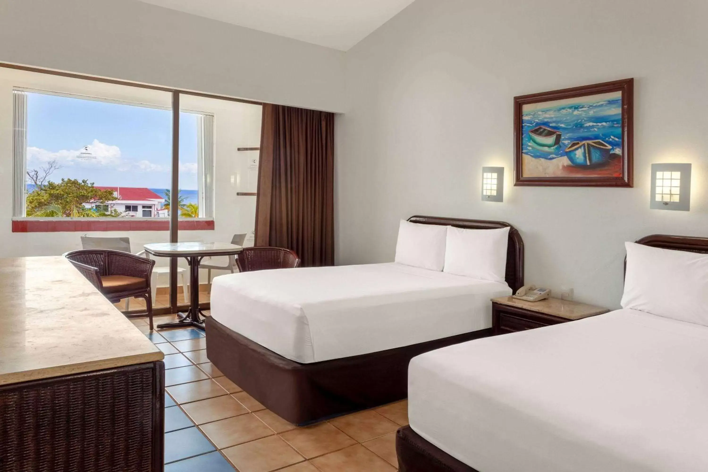 Photo of the whole room, Bed in Cozumel Hotel & Resort Trademark Collection by Wyndham