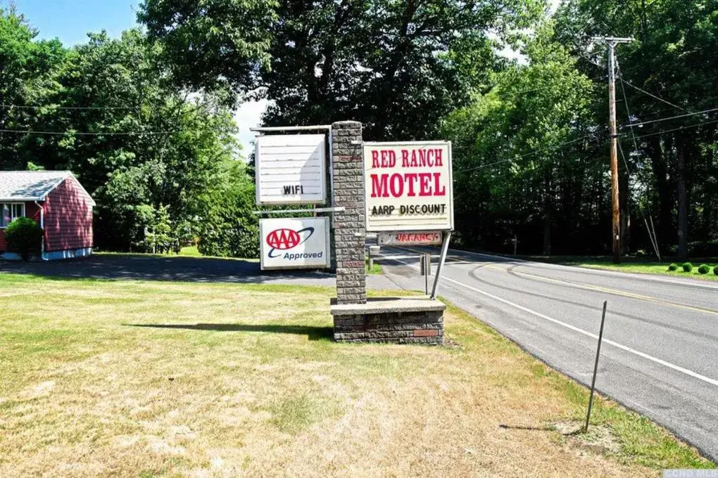 Property logo or sign in Red Ranch Inn