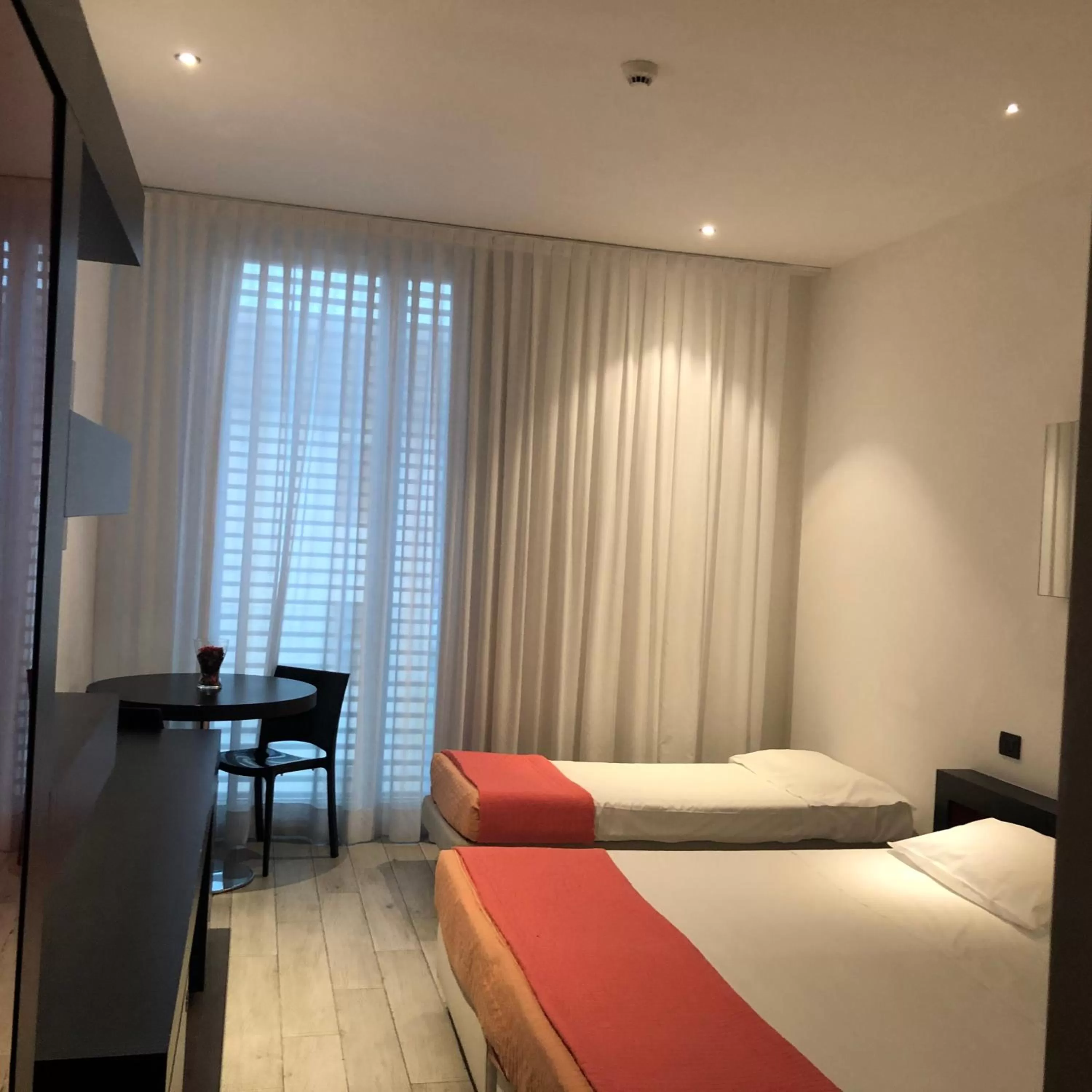 Bed in Blue Shades Hotel