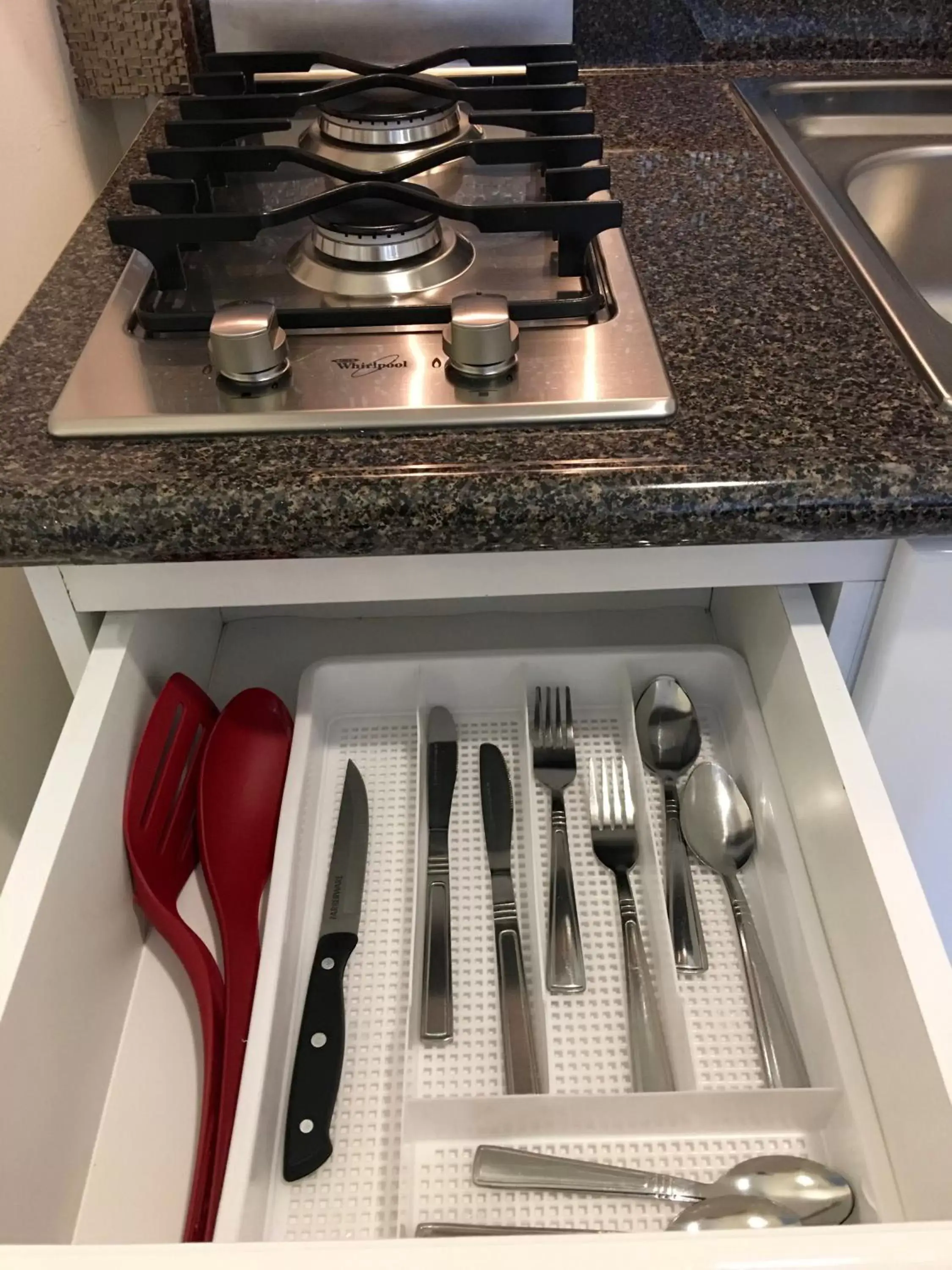 Decorative detail, Kitchen/Kitchenette in Herbal Inn Suites