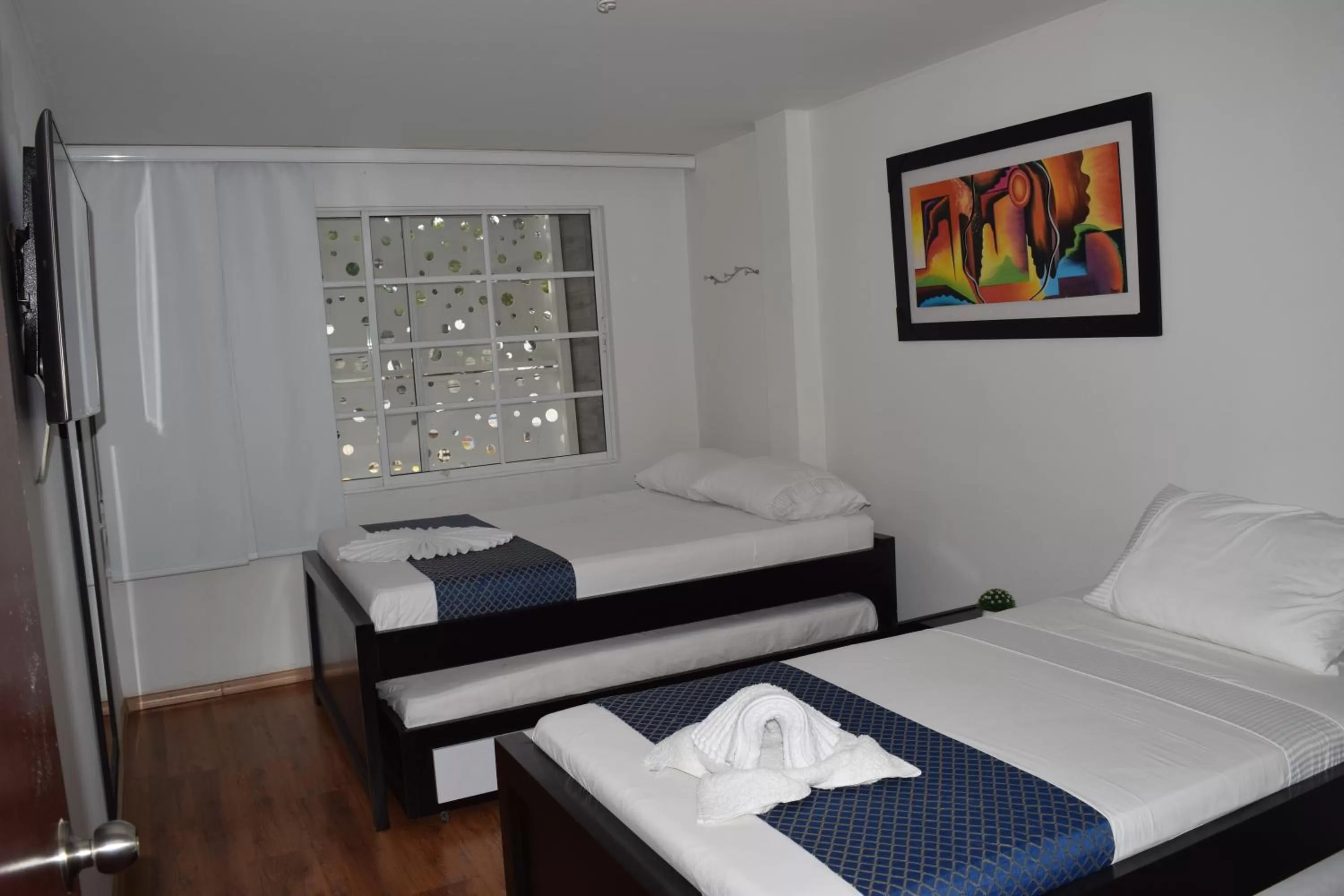 Toilet, Bed in Hotel Travelers Sport