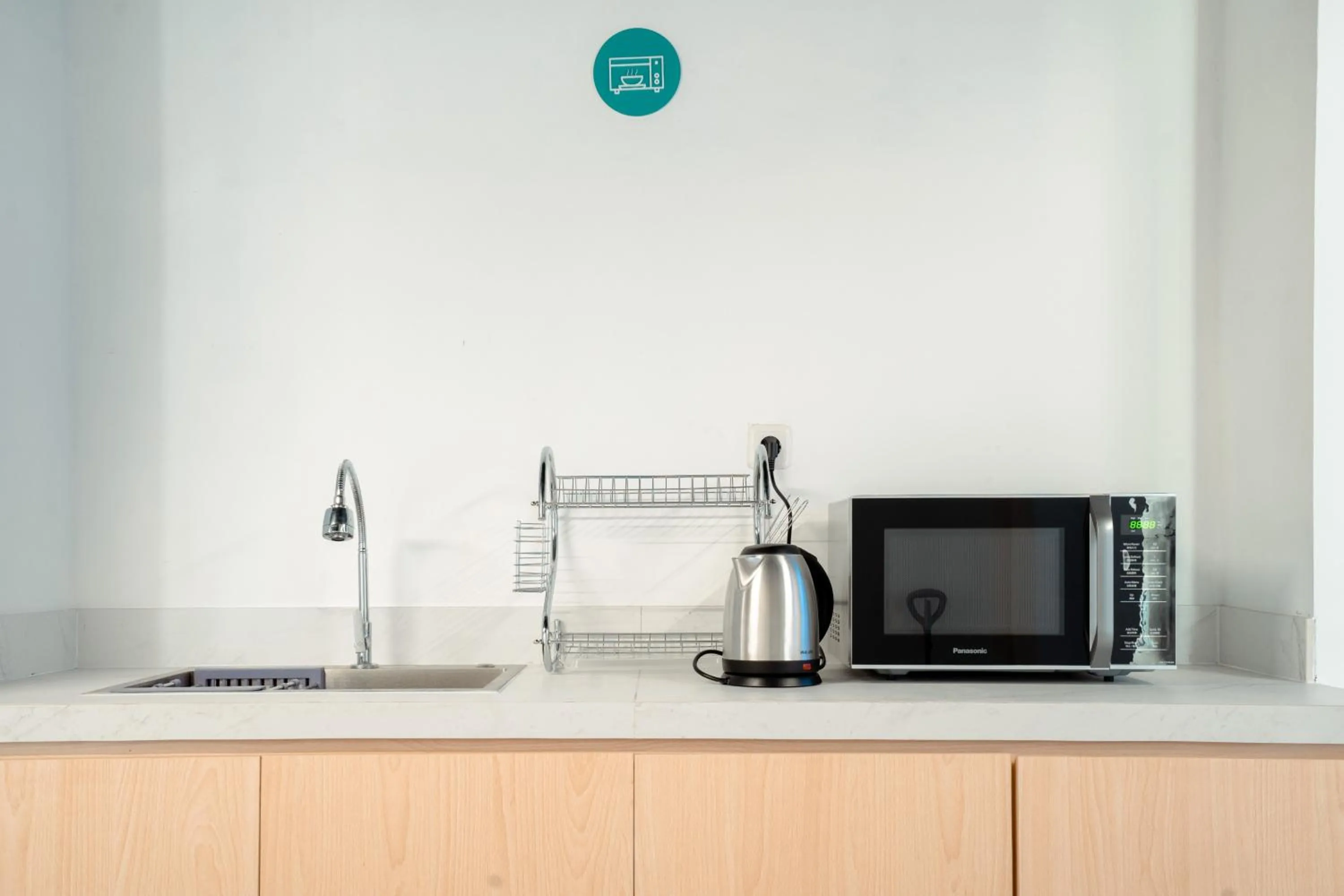 Communal kitchen in Bobopod Kebayoran Baru, Jakarta