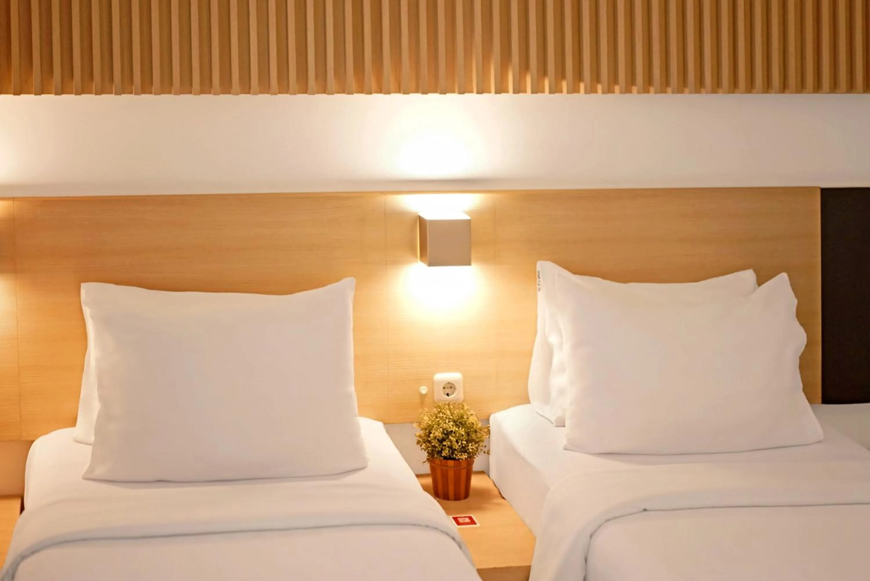 Bed in Malaka Hotel Bandung