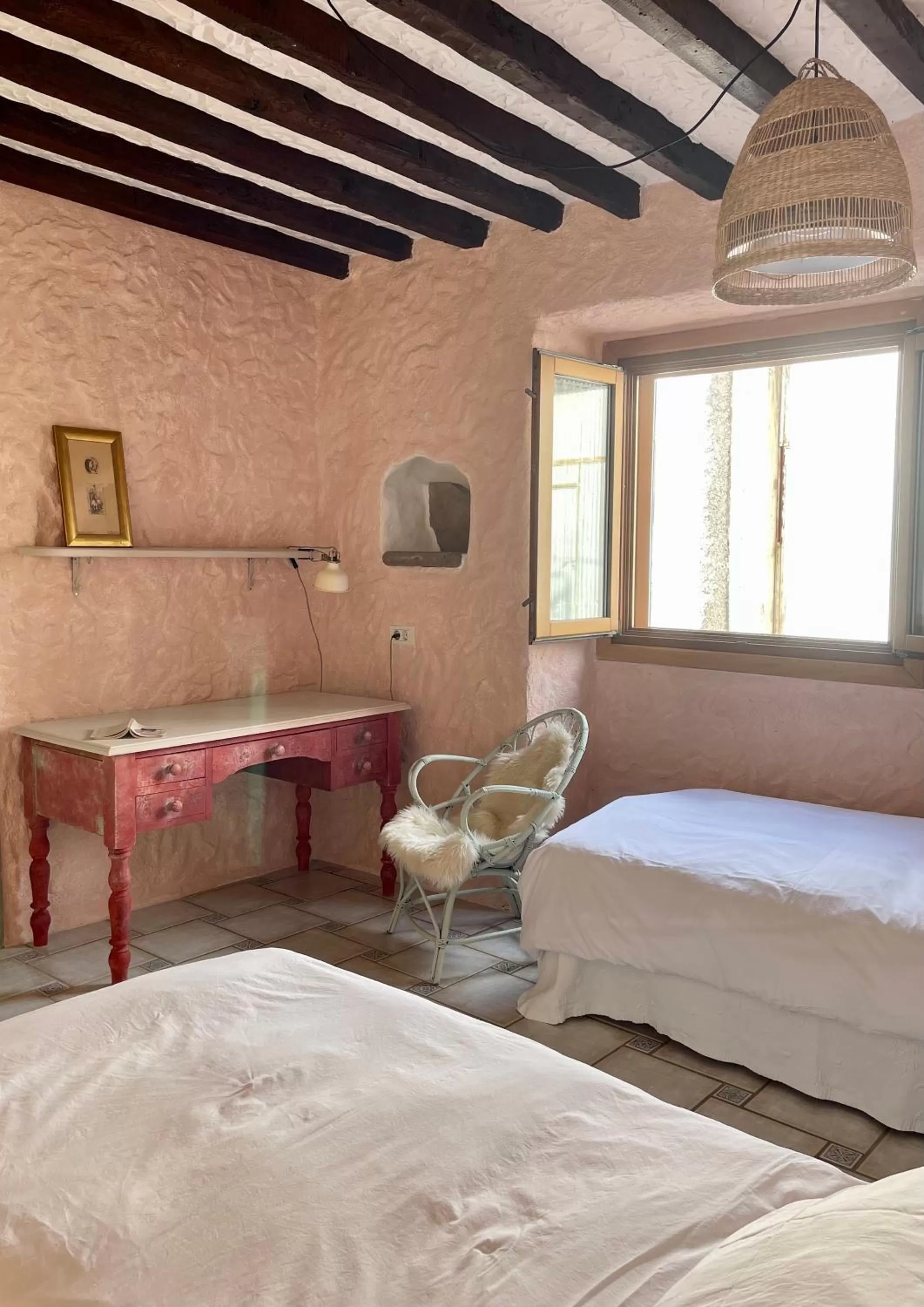 Bed in Sansofi Guesthouse