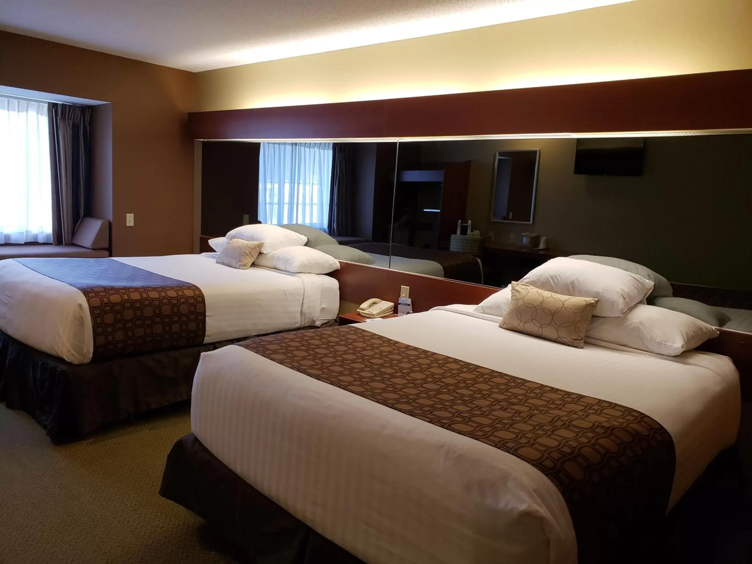 Bed in Microtel Inn & Suites Dover by Wyndham