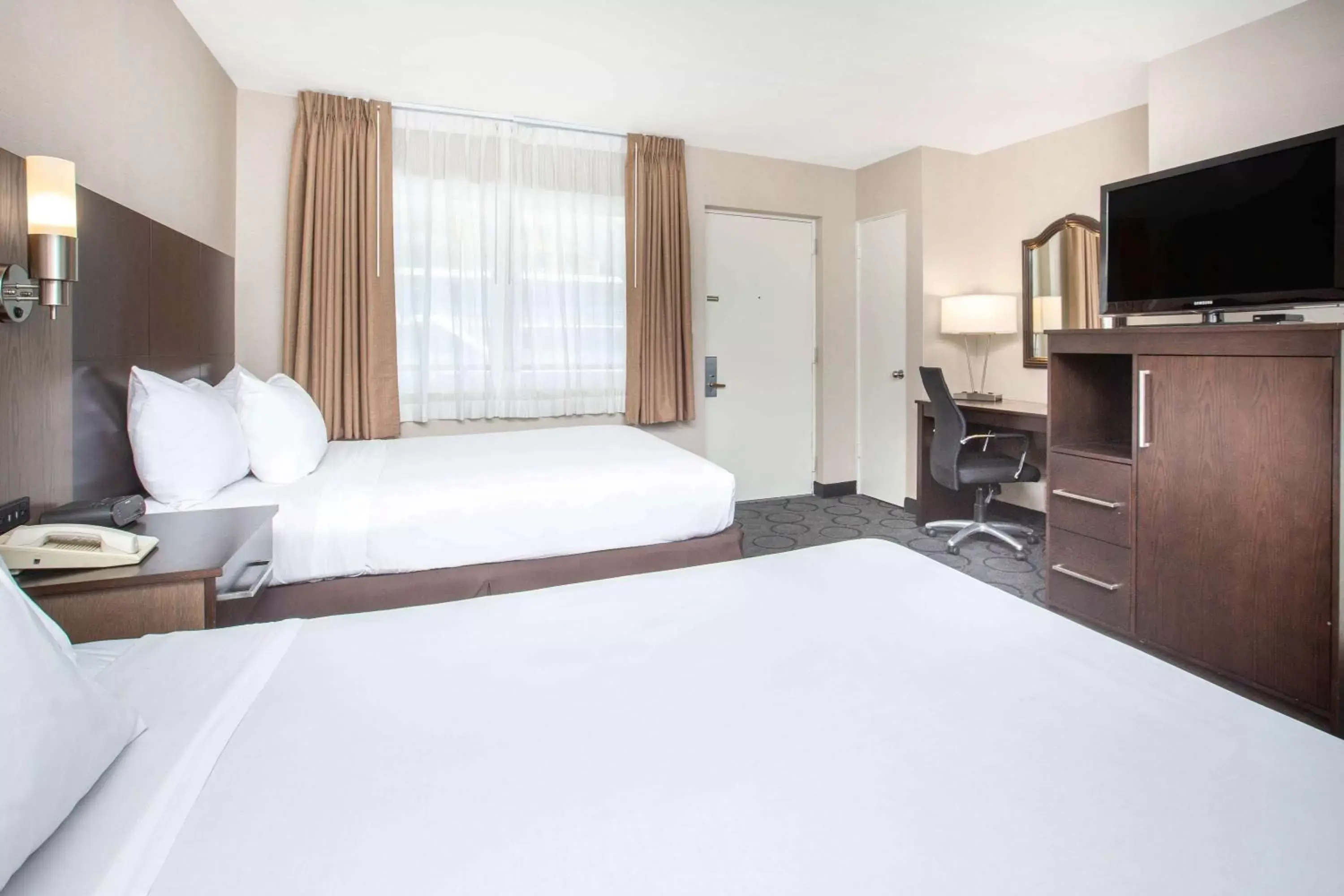 Photo of the whole room, Bed in Baymont by Wyndham San Diego Downtown