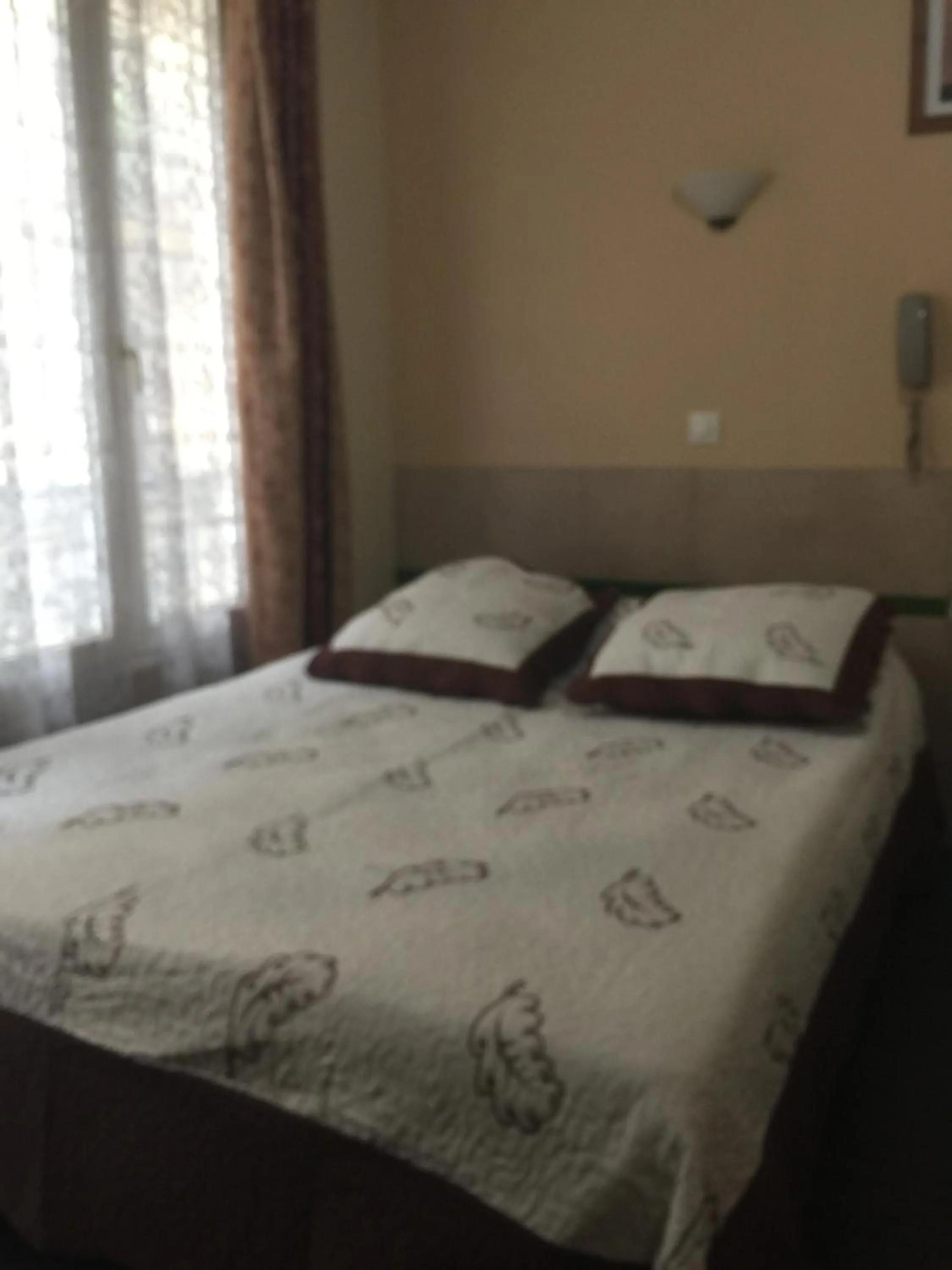 Bed in Hôtel Jarry Confort