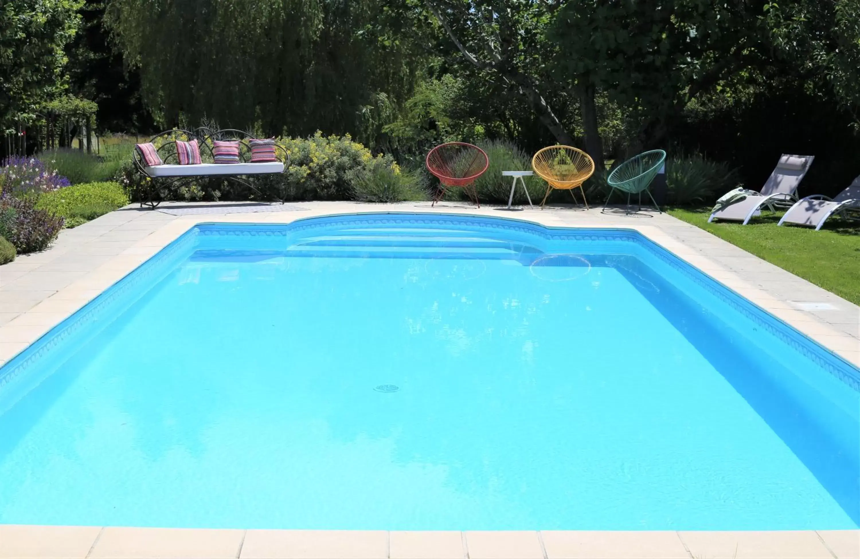 Swimming Pool in Au Do'Mayne des Bouilles - Spa & Piscine