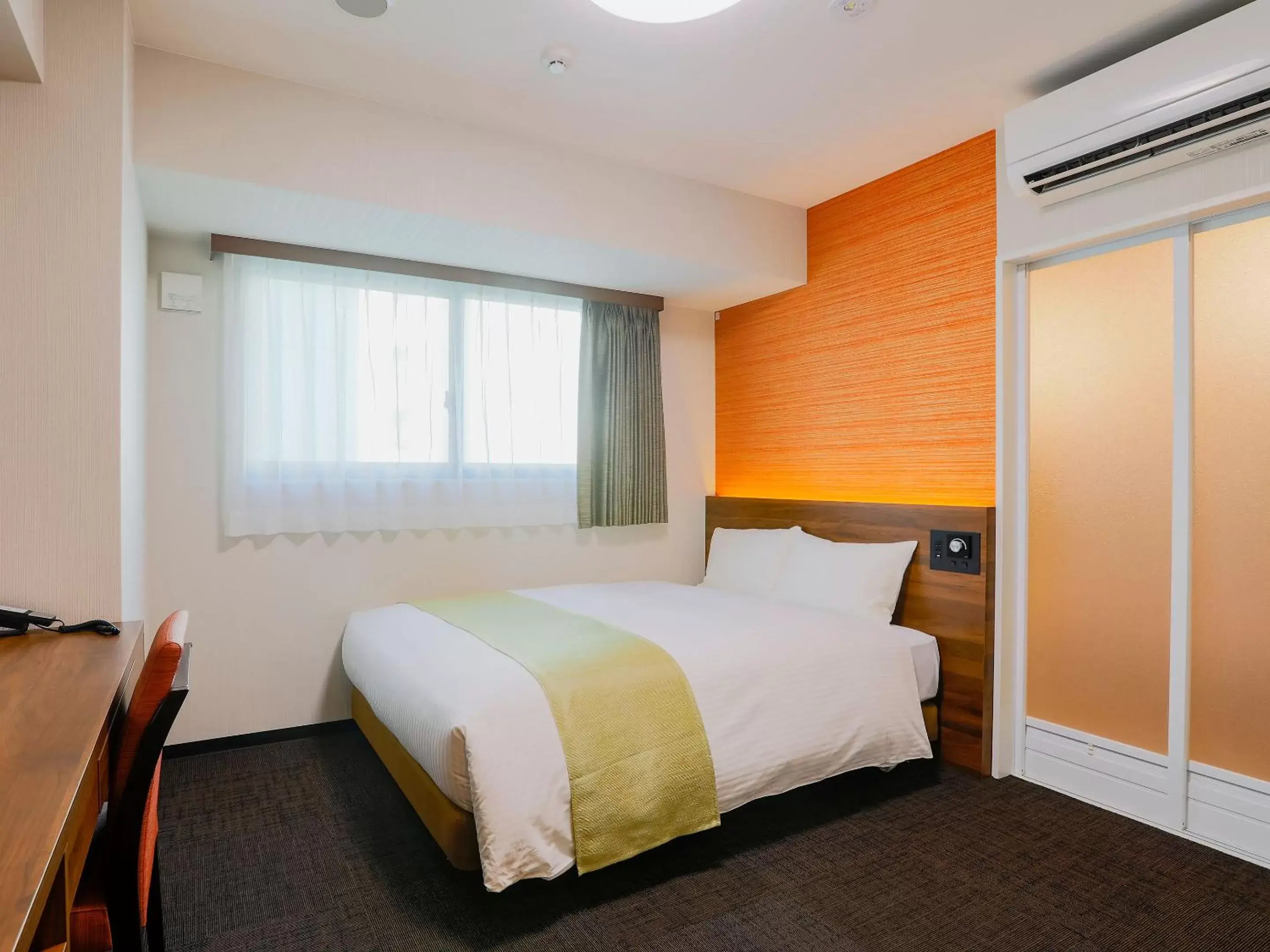 Bed in Hotel Wing International Takamatsu