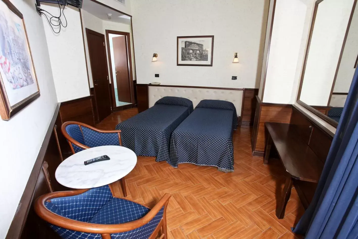 Bed, Seating Area in Hotel Nardizzi Americana