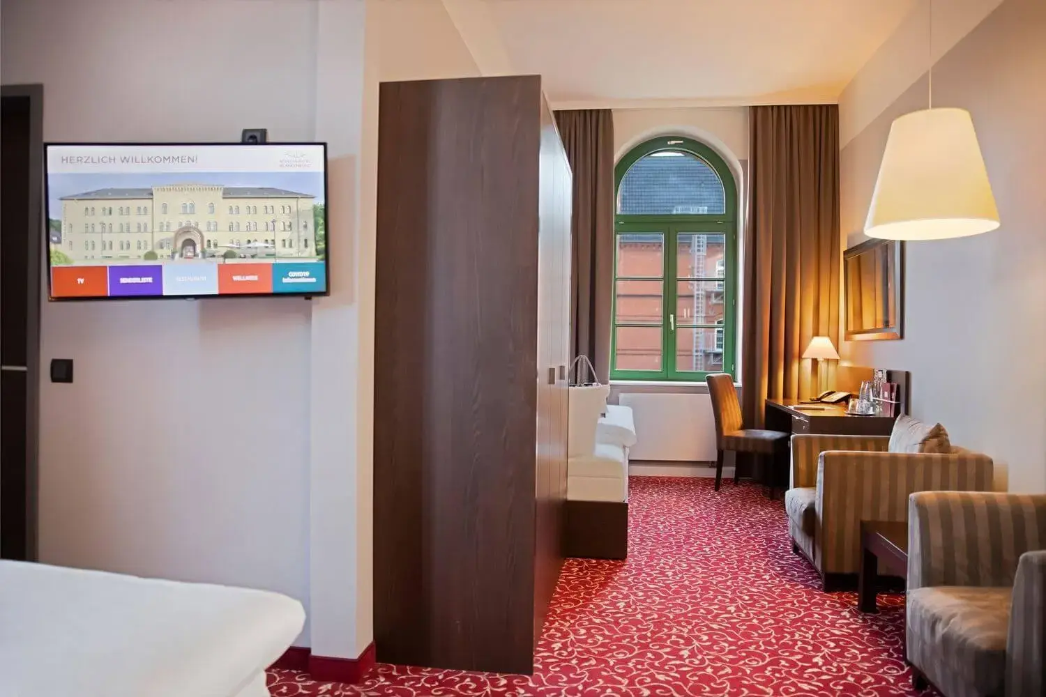 Photo of the whole room, TV/Entertainment Center in GreenLine Schlosshotel Blankenburg