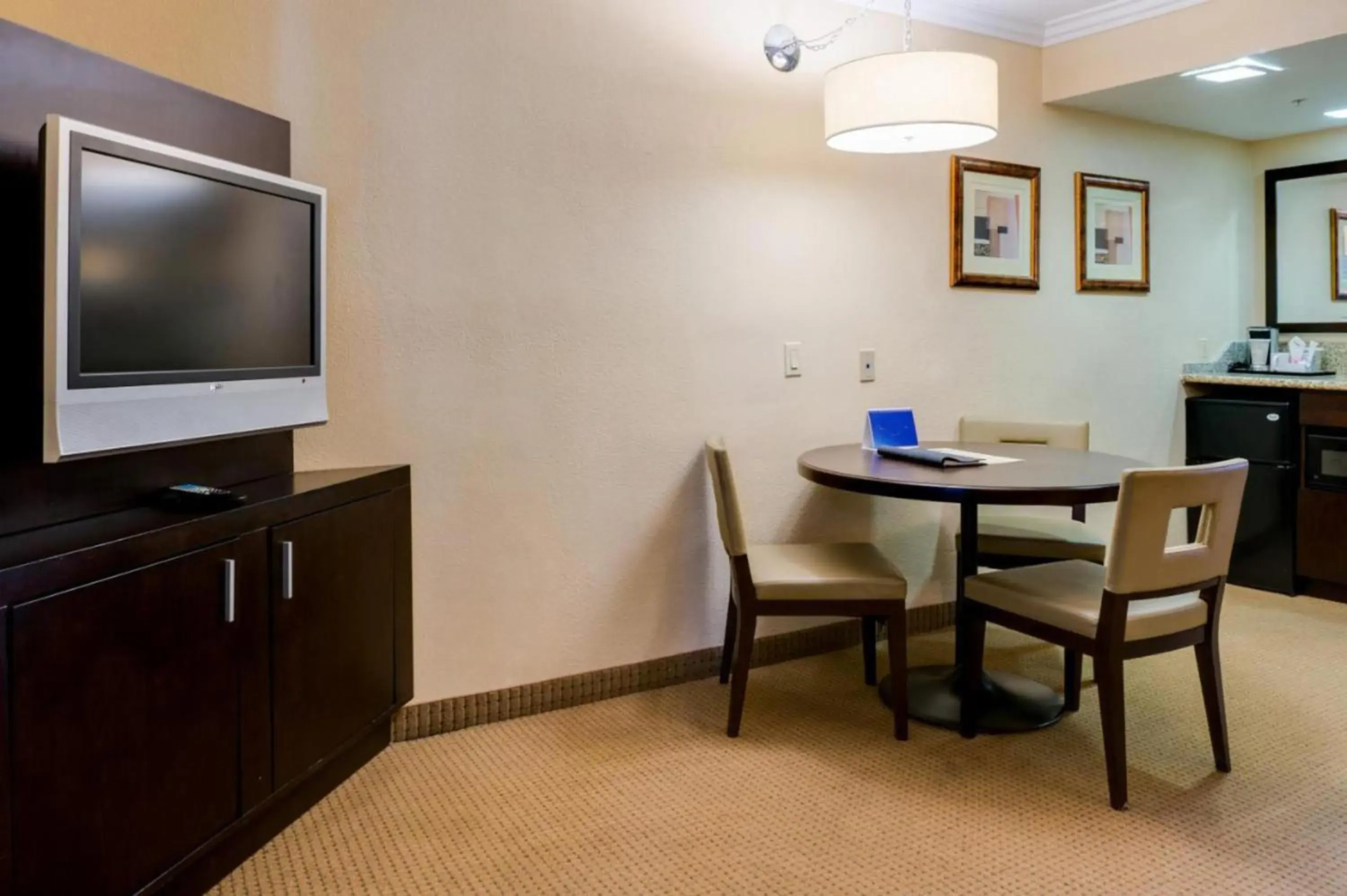 TV and multimedia, TV/Entertainment Center in Buena Park Grand Hotel & Suites