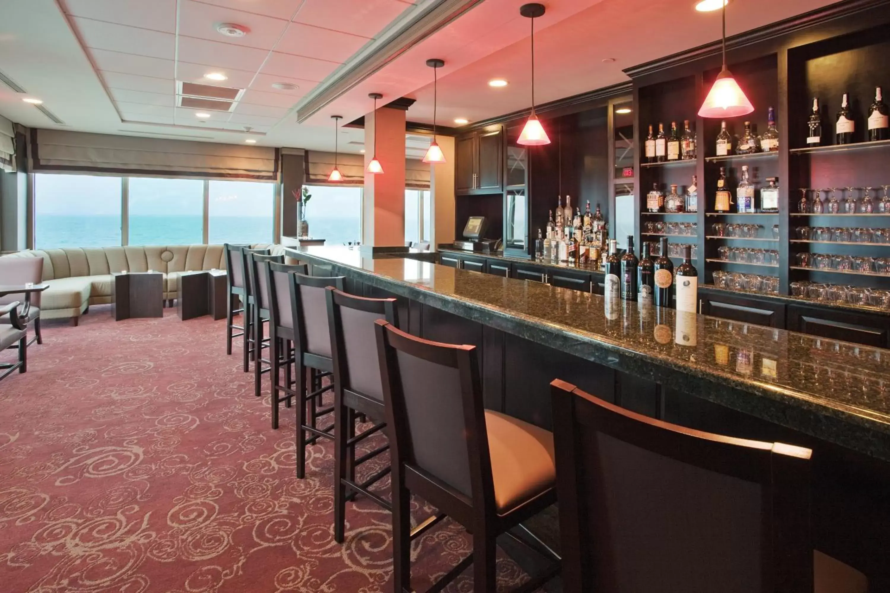 Lounge or bar in Holiday Inn & Suites Virginia Beach - North Beach, an IHG Hotel