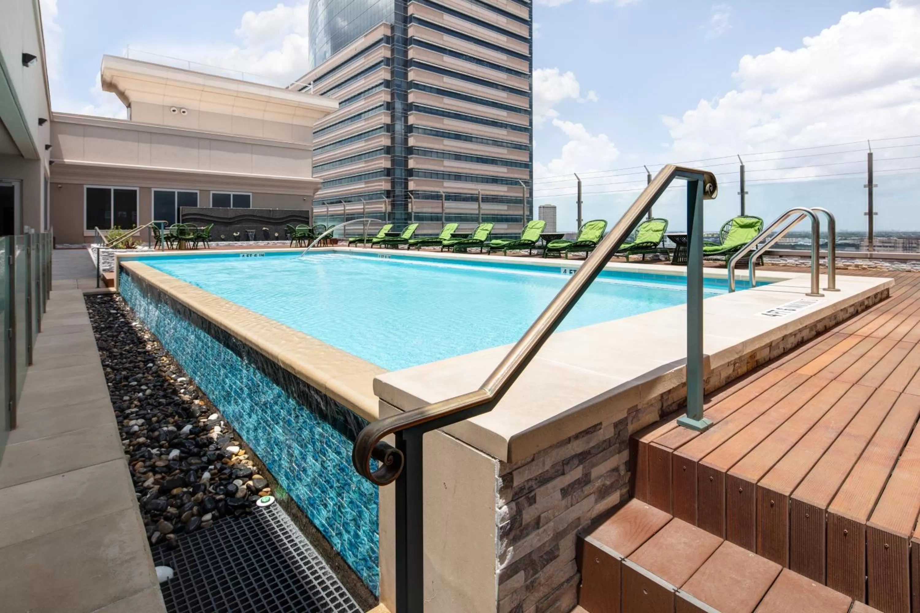 Swimming pool in Blossom Hotel Houston, Curio Collection by Hilton