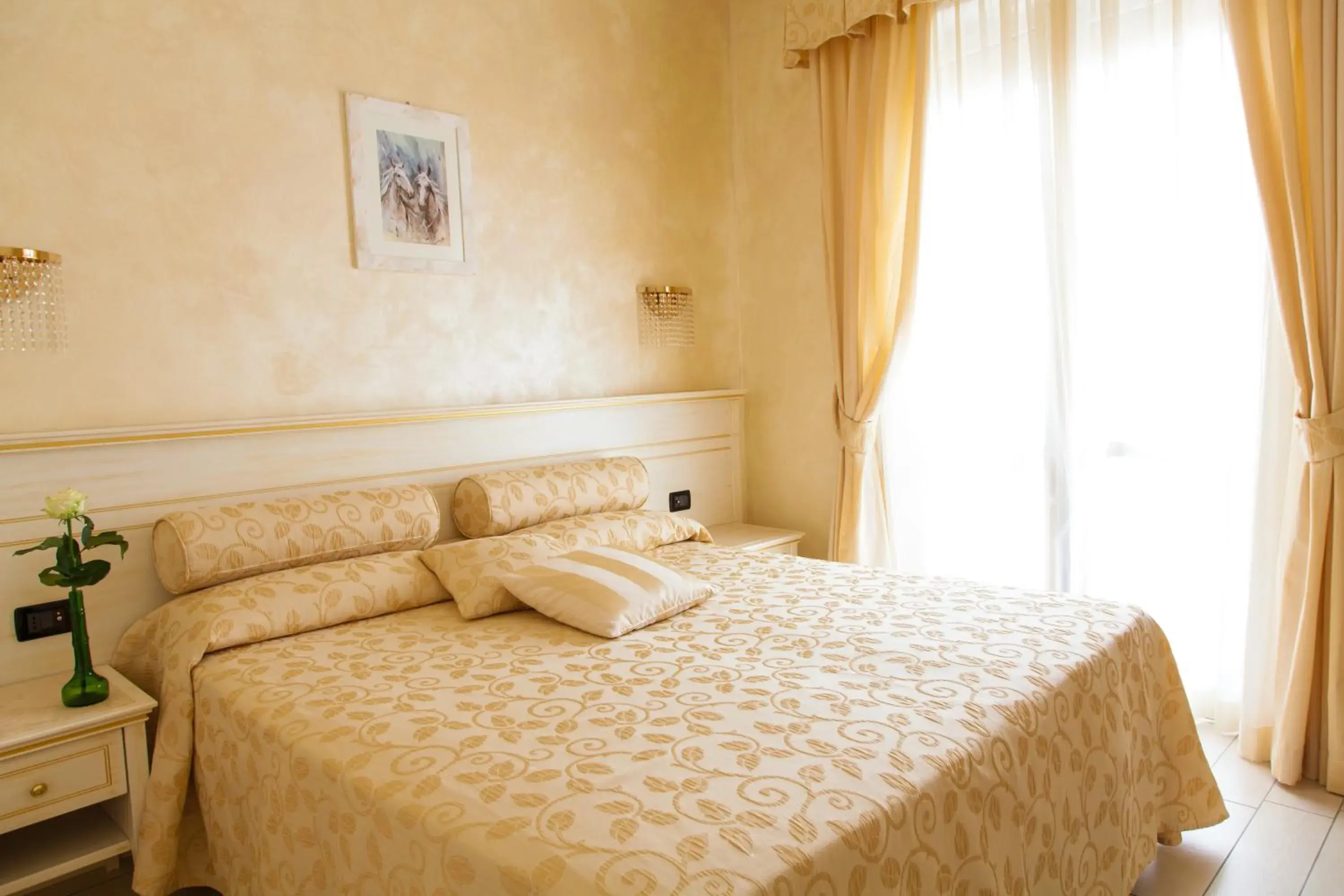 Bed in Allegroitalia Alassio Rosa