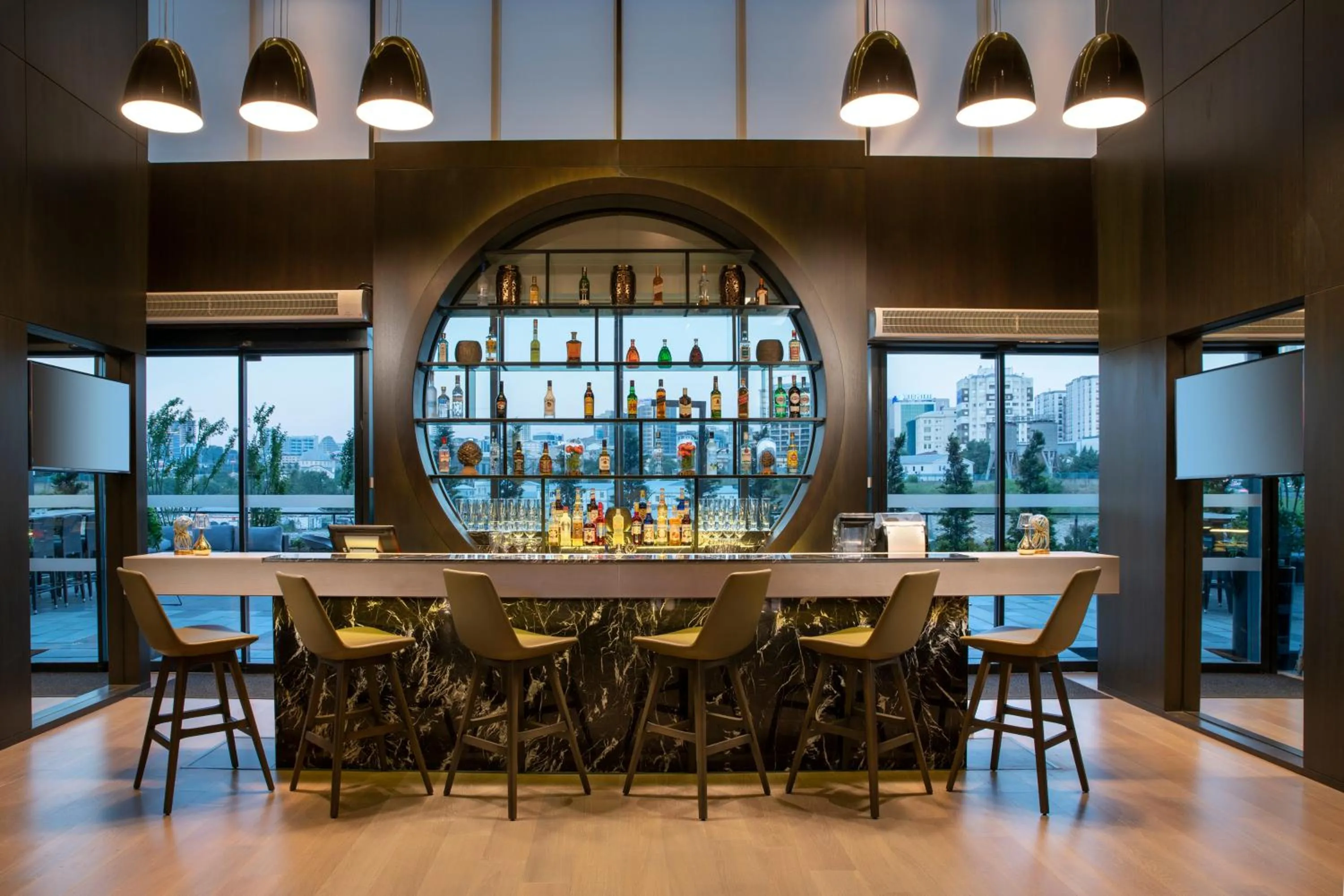 Lounge or bar in Centro Westside by Rotana