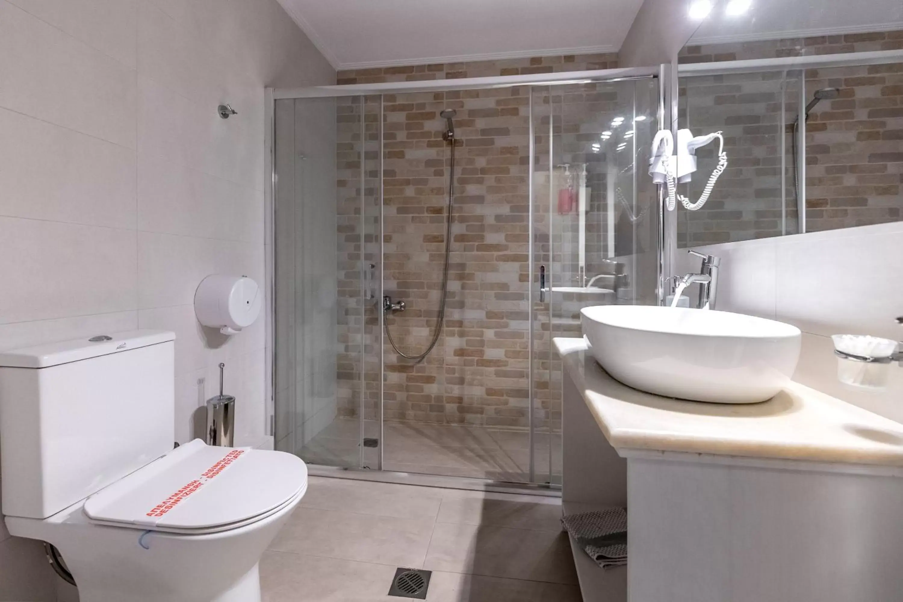 Bathroom in Apartments Tina FREE transfer from-to the airport