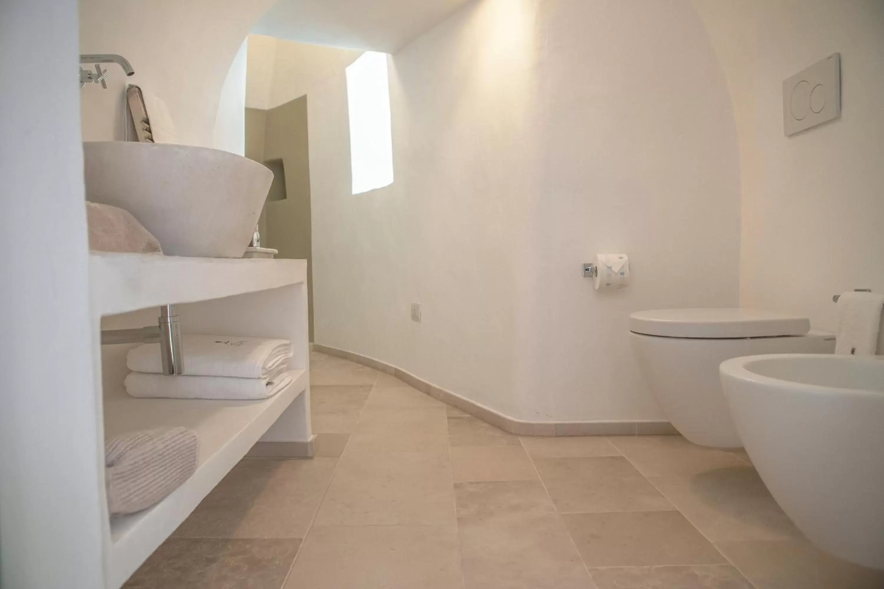 Bathroom in Trullo Essenza-Trulli Antì Charme & Relax