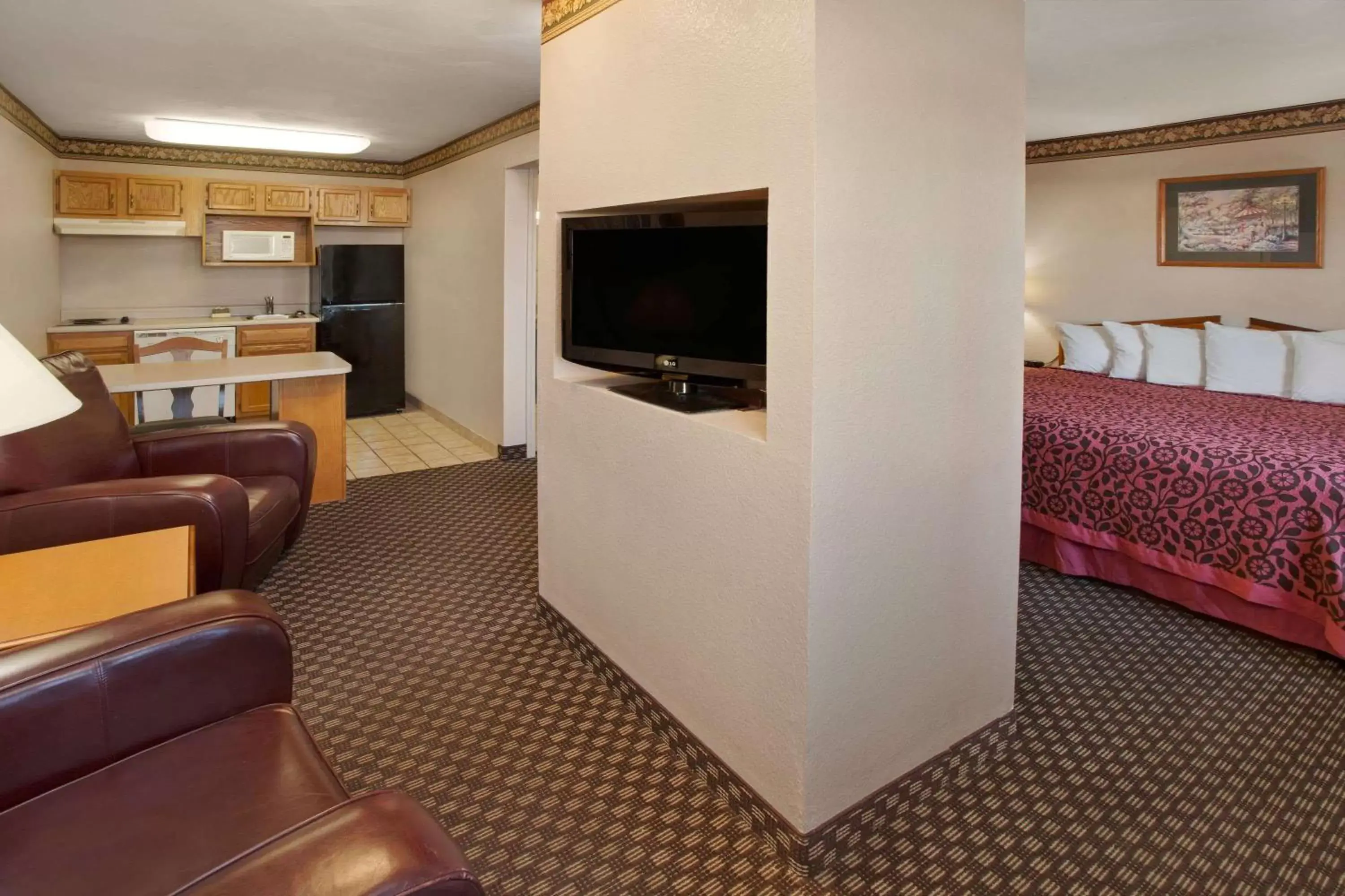 Photo of the whole room, TV/Entertainment Center in Days Inn & Suites by Wyndham Kokomo