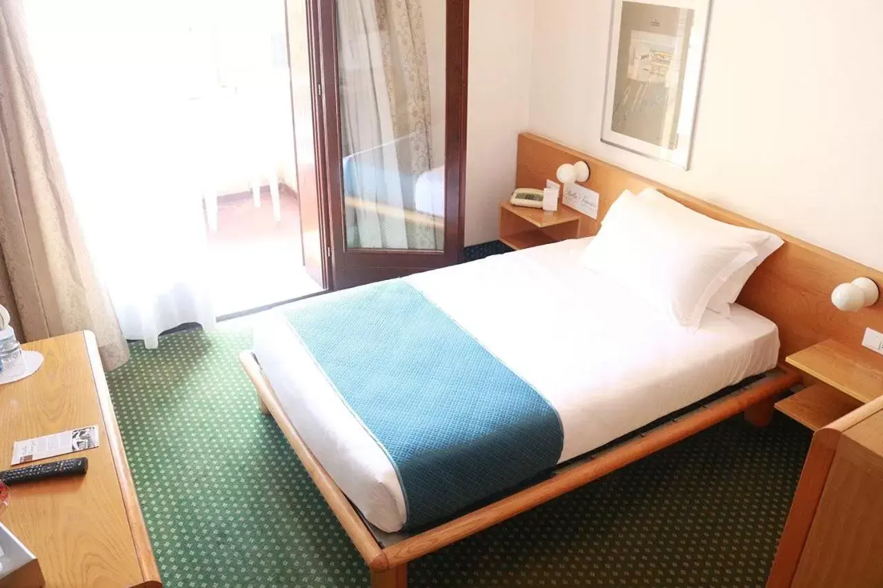 Bed in Hotel Bella Venezia