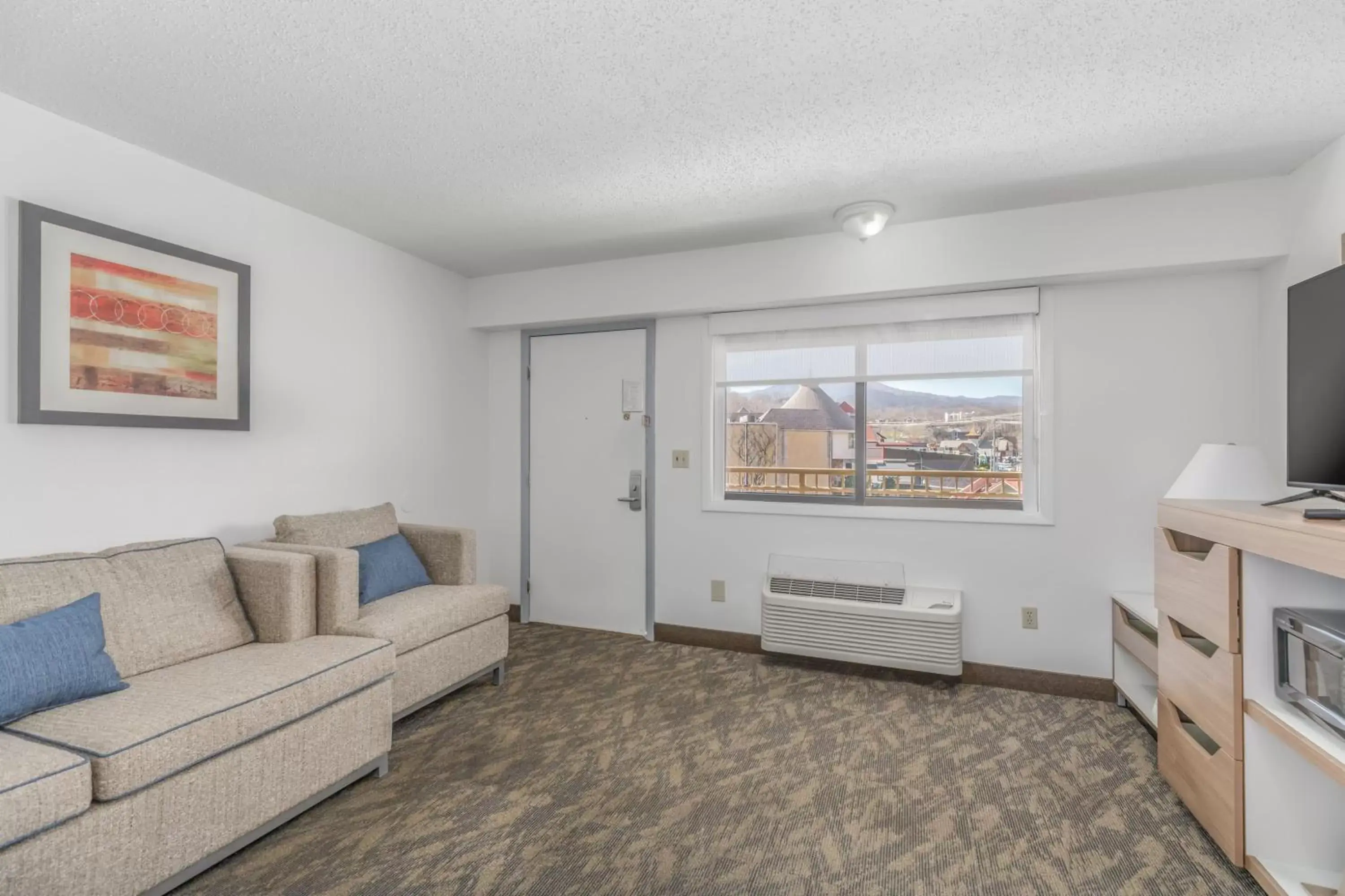 Seating Area in Crossroads Inn & Suites