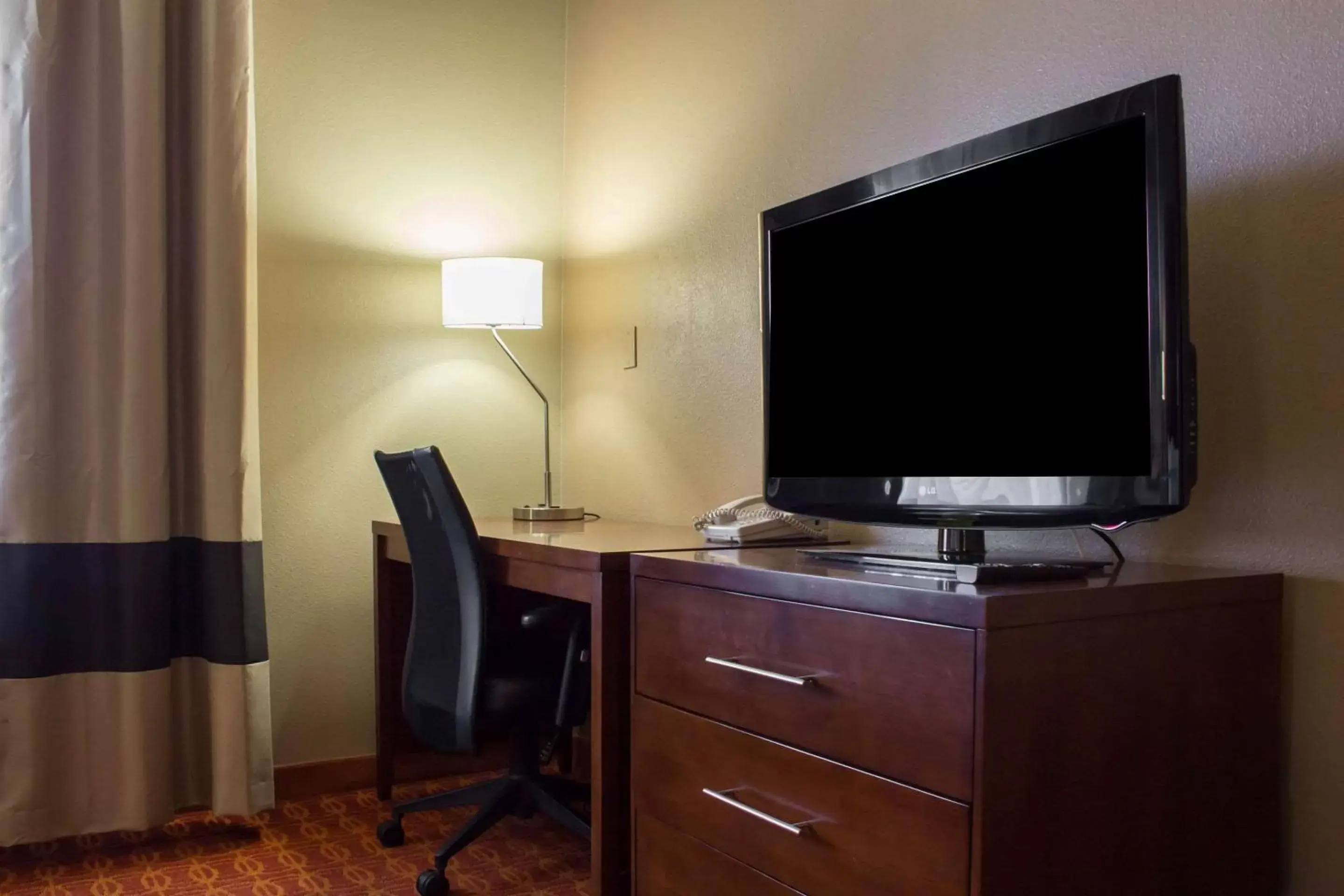 Photo of the whole room, TV/Entertainment Center in Comfort Inn & Suites near Kino Sports Complex