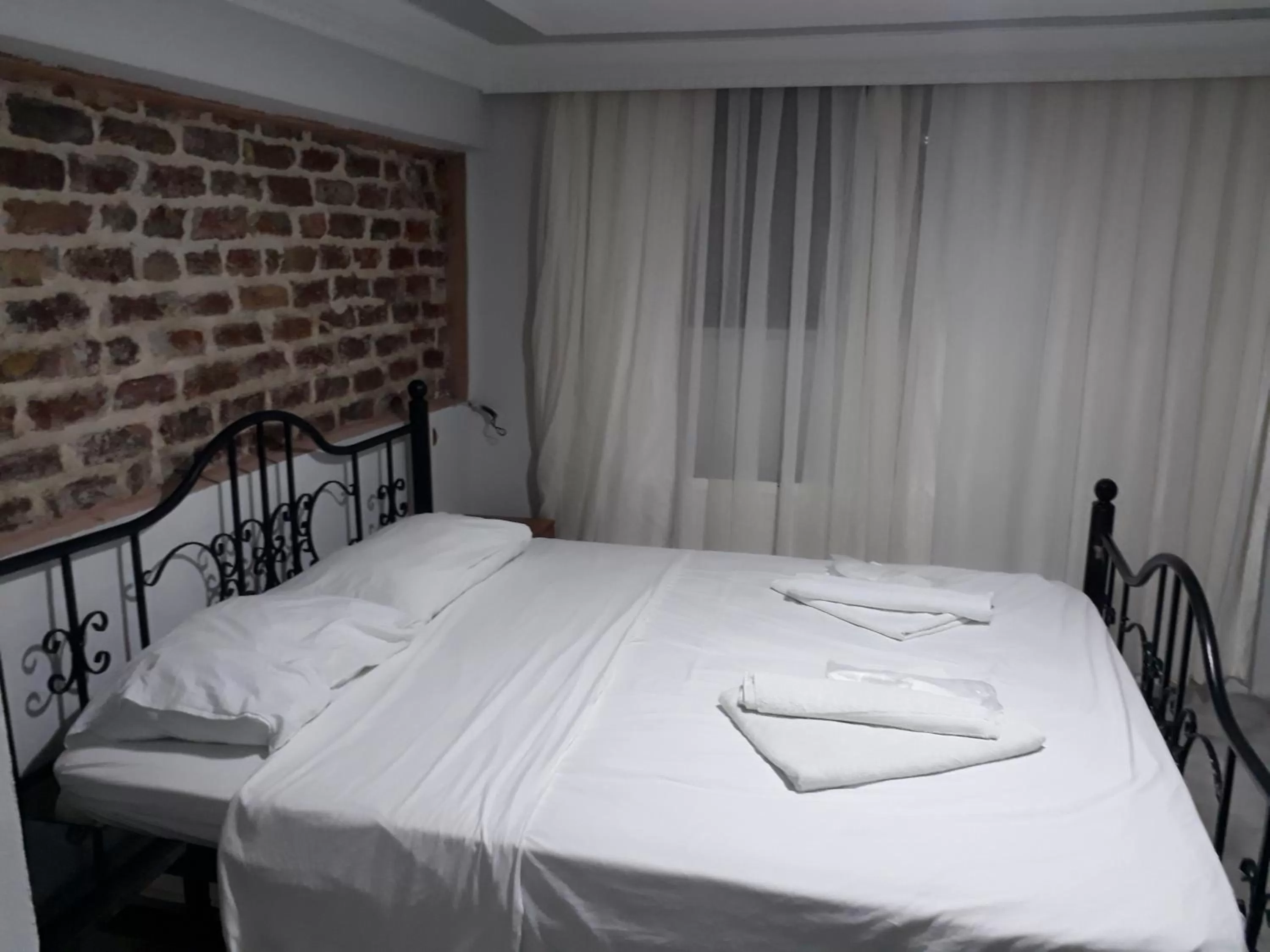 Bed in Arat Apartments