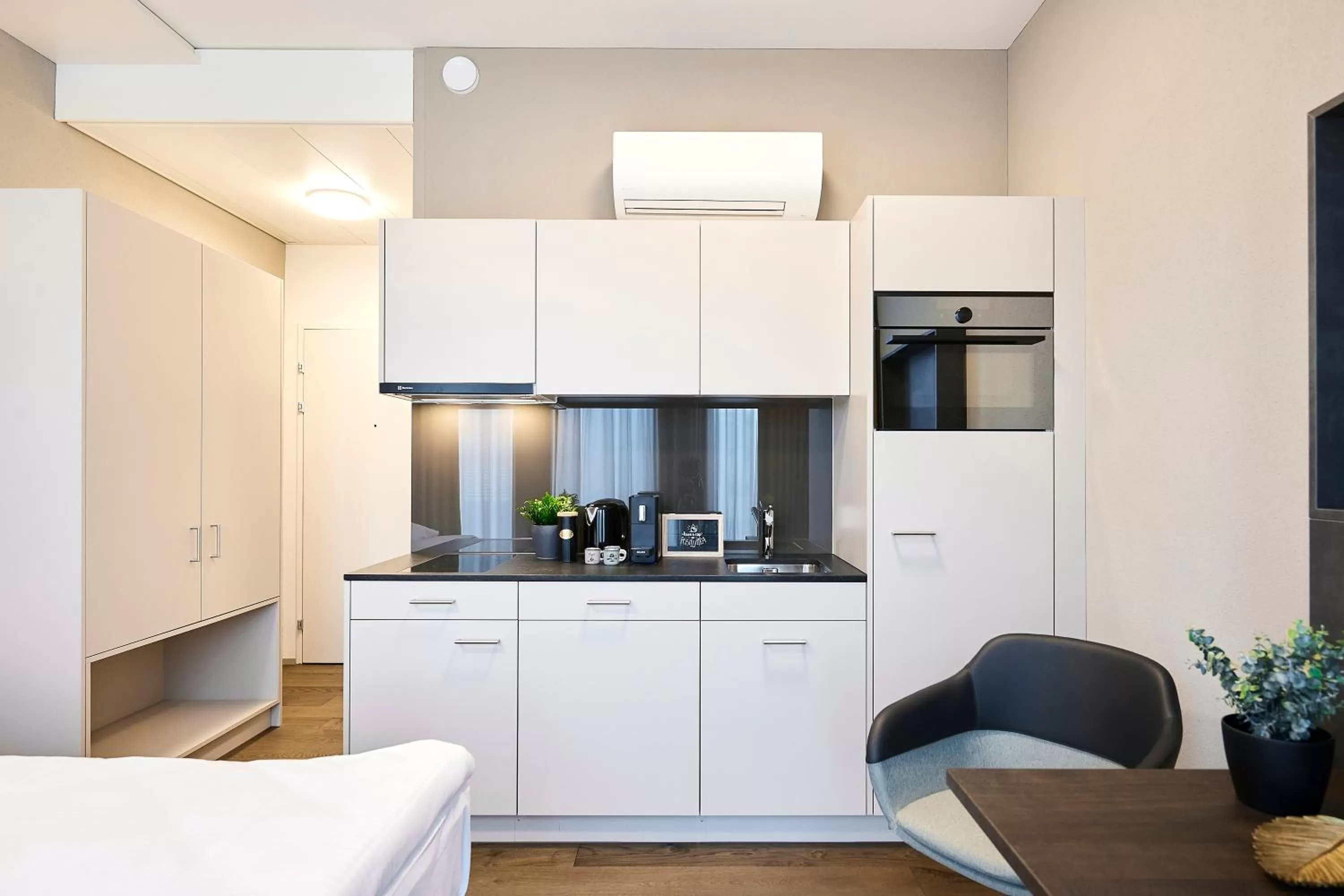 Kitchen or kitchenette in Lumen Apartments