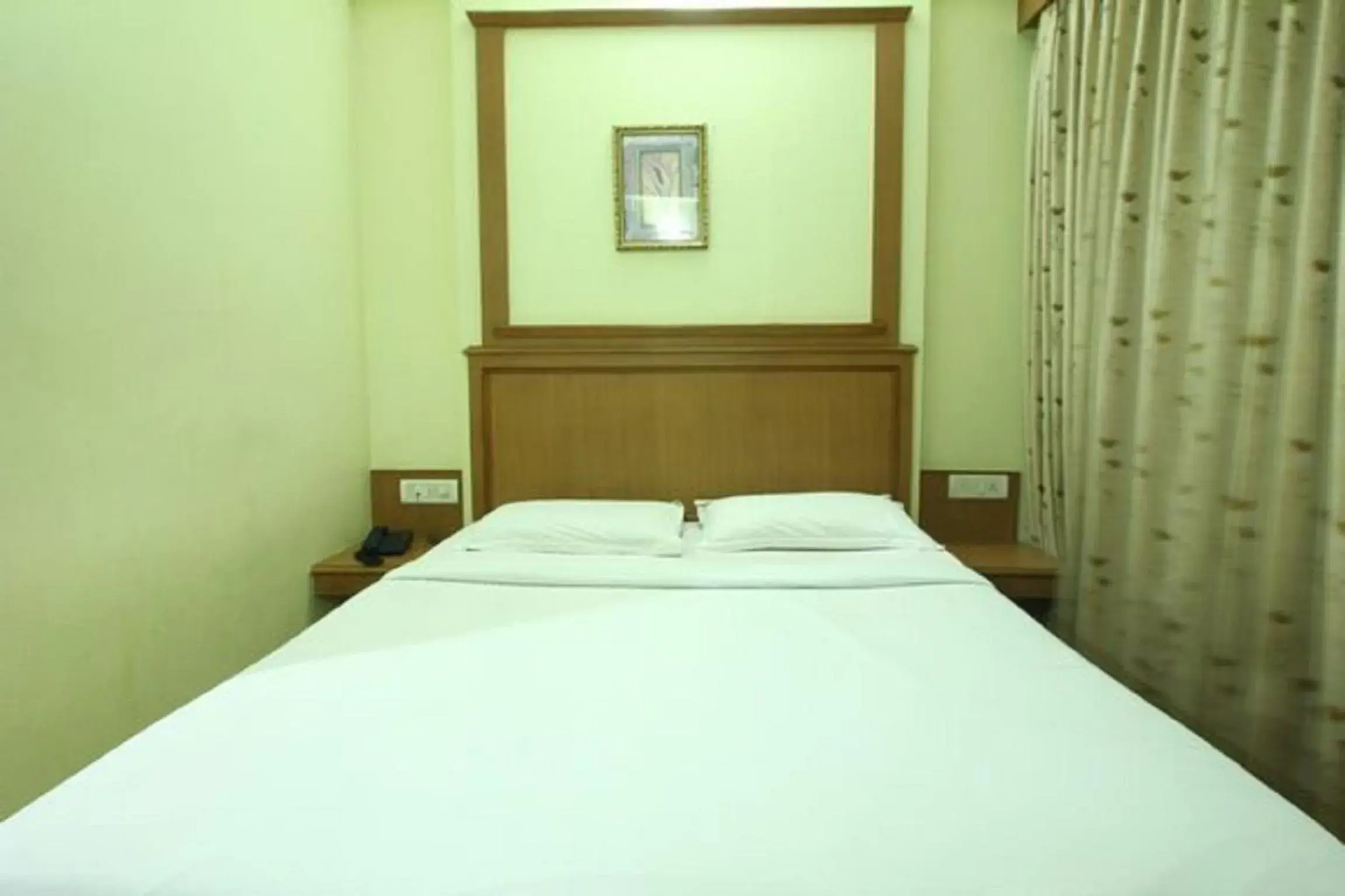 Bed in Hotel Roopa