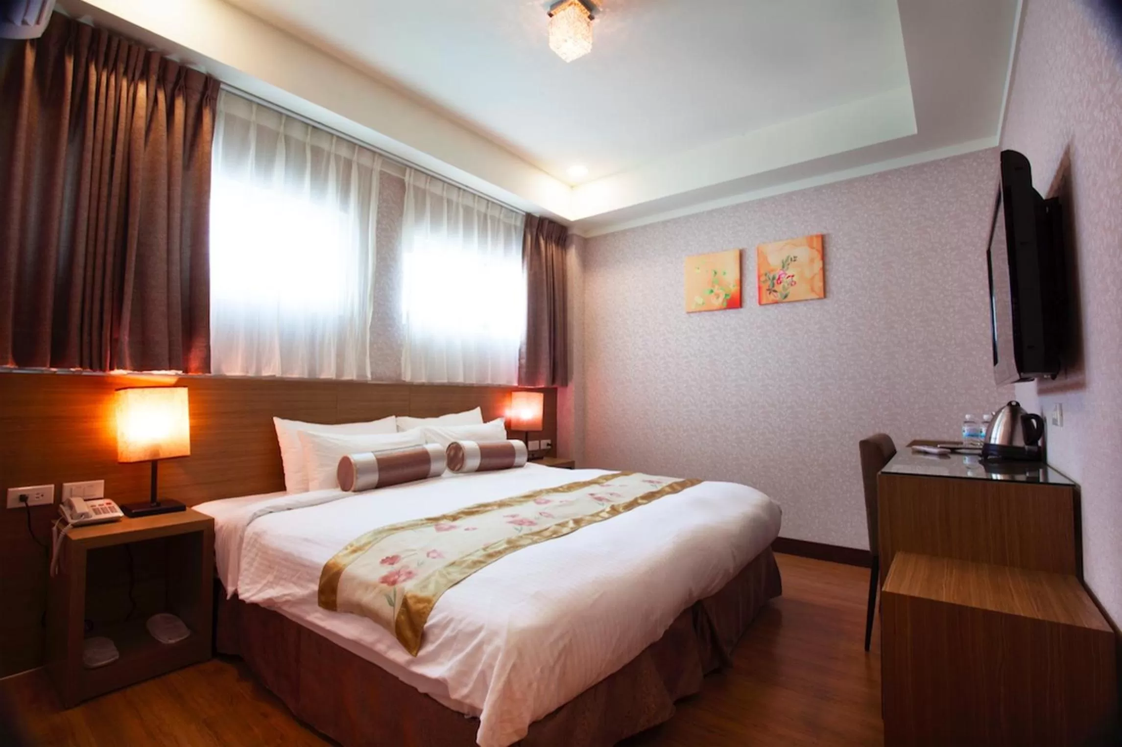 Bed in True Friend Hotel