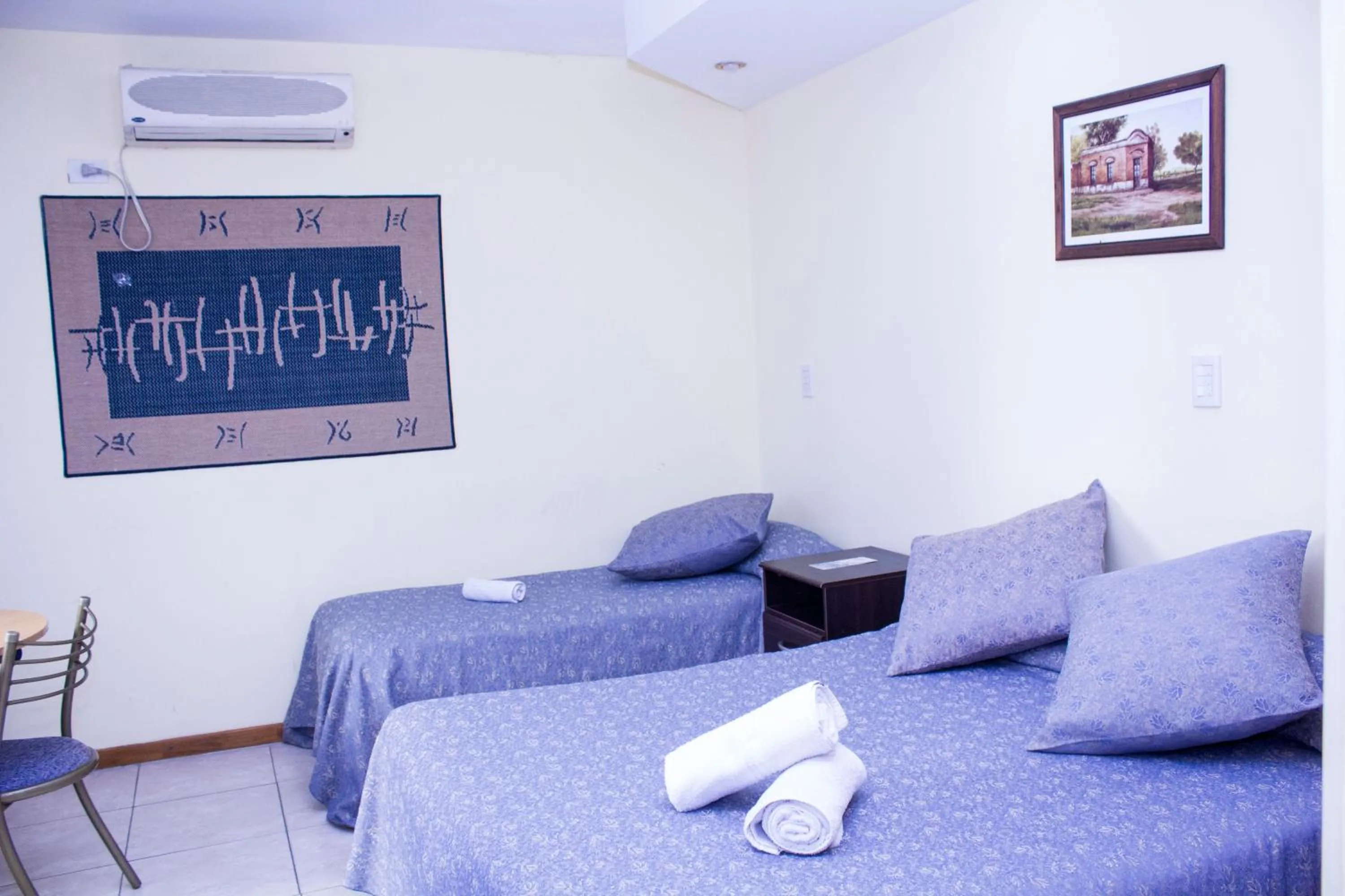 Bed in San Remo City Hotel