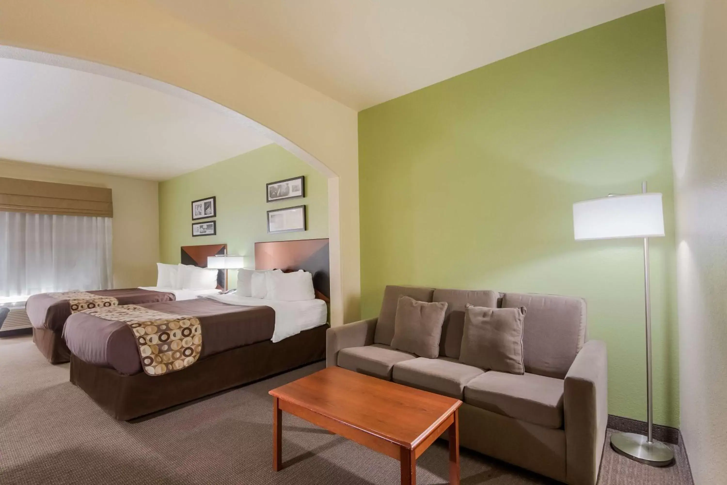 Bedroom in SureStay Plus Hotel by Best Western Near SeaWorld San Antonio