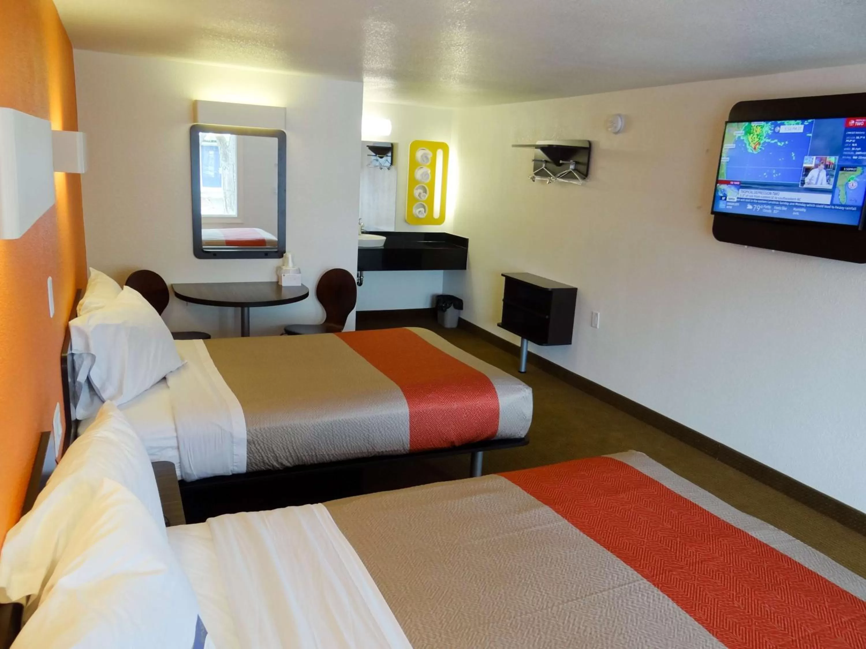 Bathroom, Bed in Motel 6-Erie, PA