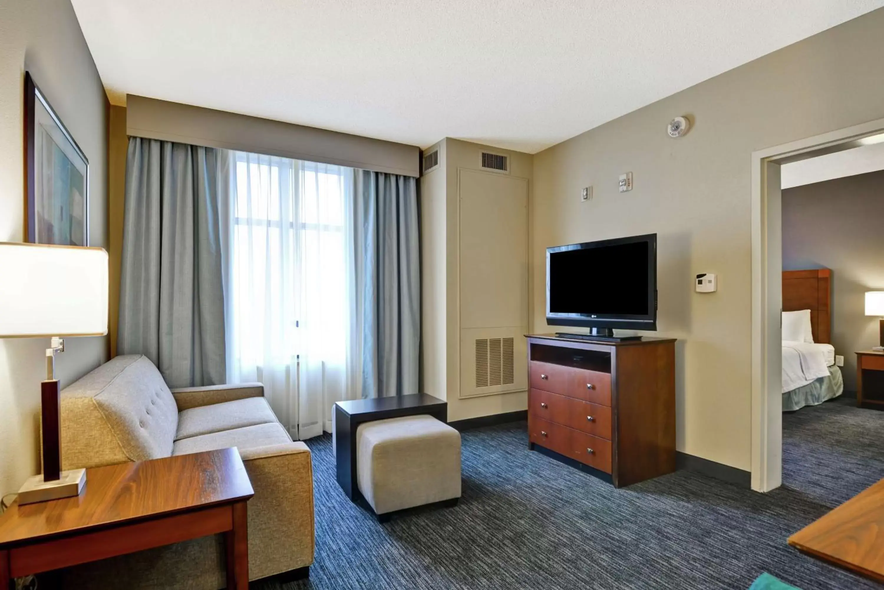 Bedroom, Seating Area in Homewood Suites Mobile East Bay/Daphne