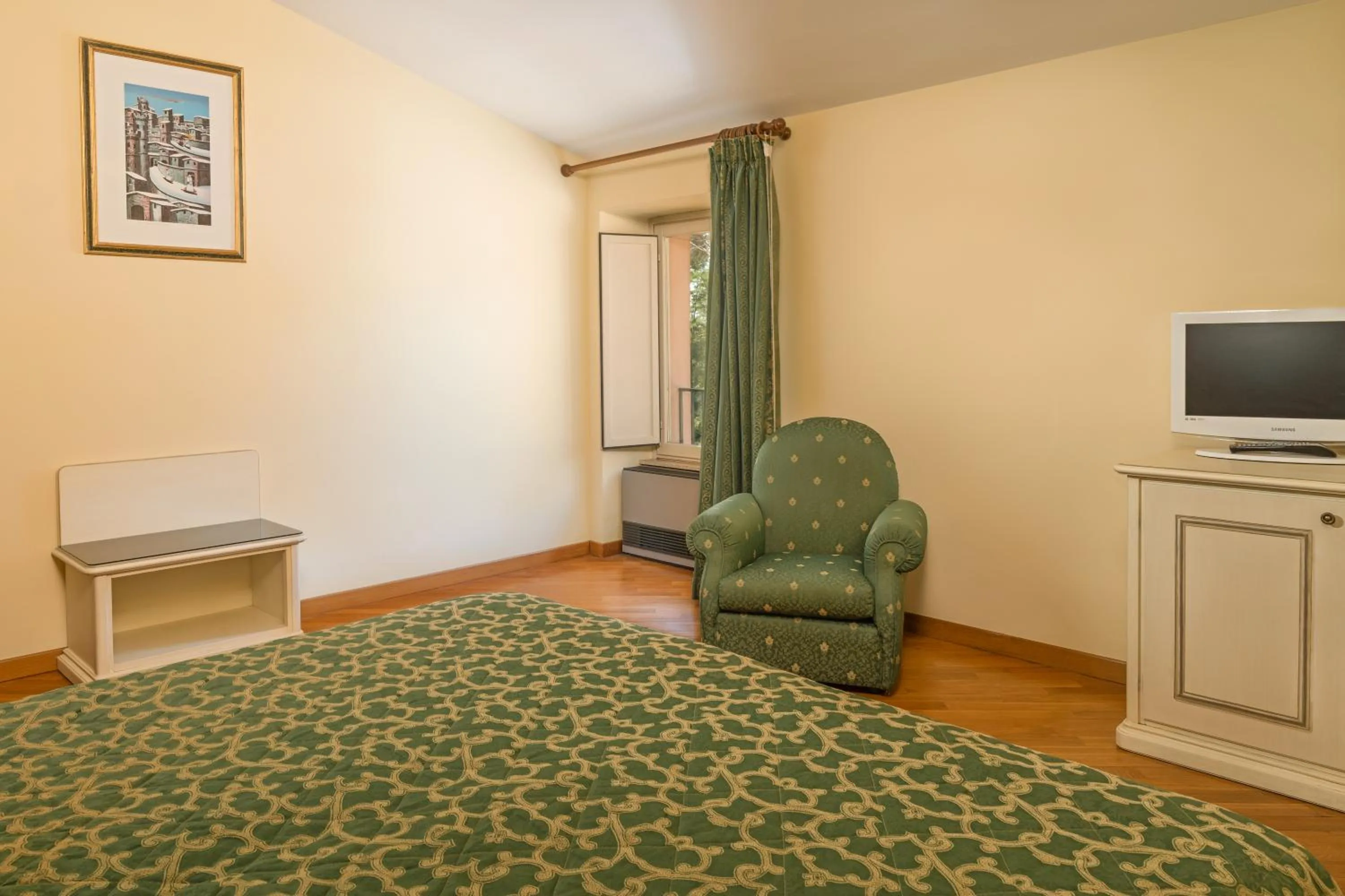 Bed, TV/Entertainment Center in Relais San Clemente