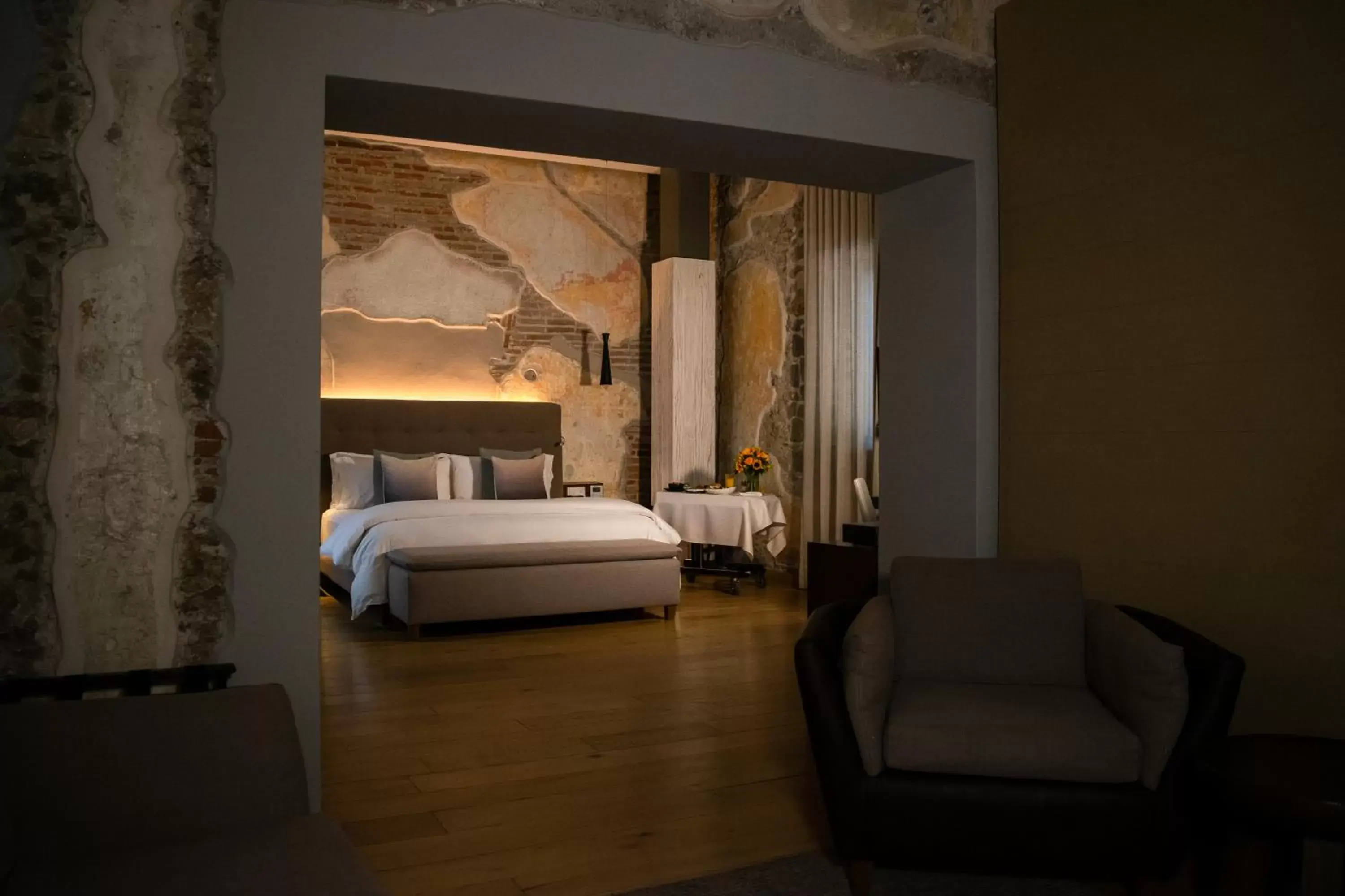 Bed, Seating Area in Cartesiano Boutique & Wellness Hotel