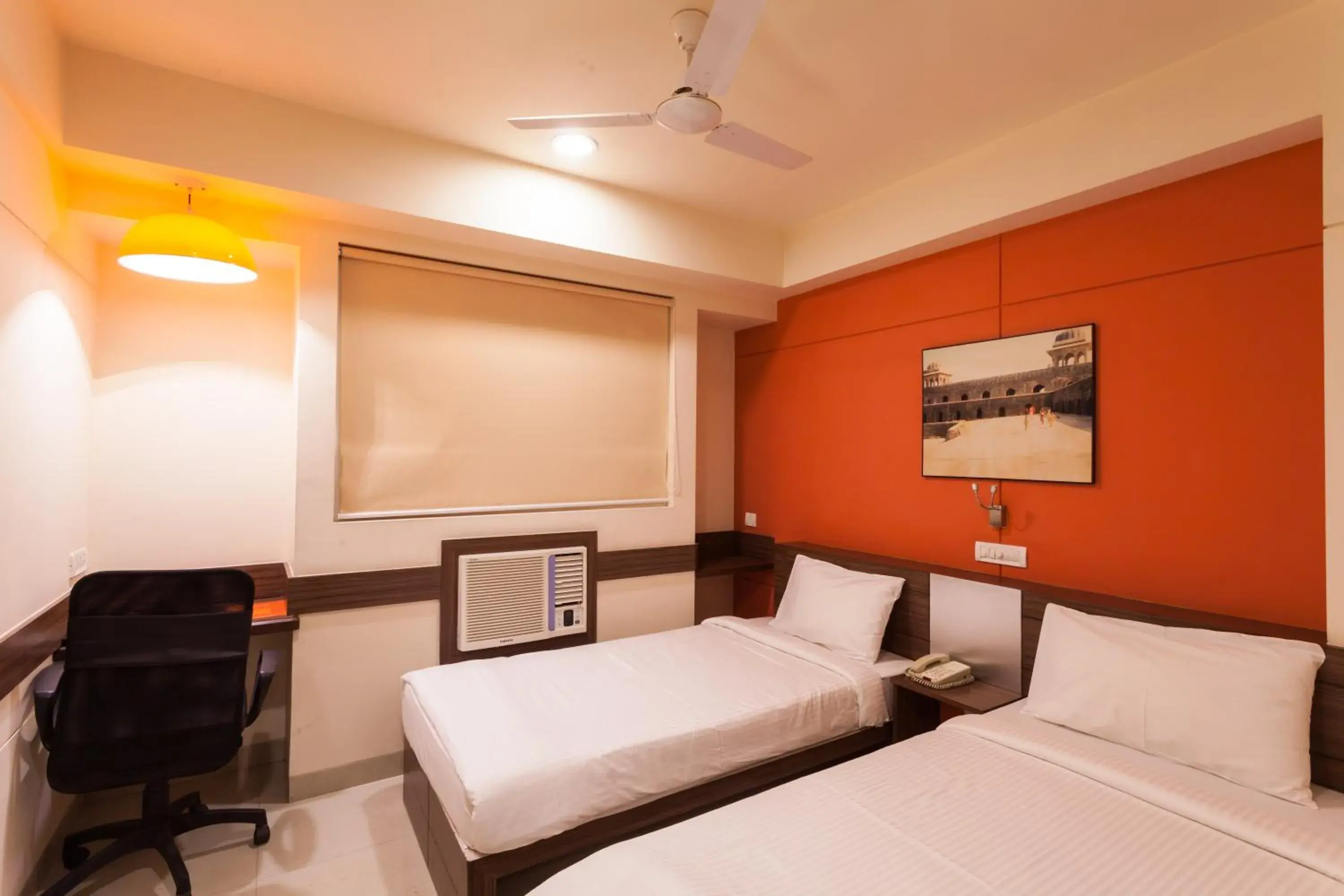 Bed in Ginger Hotel Mangalore