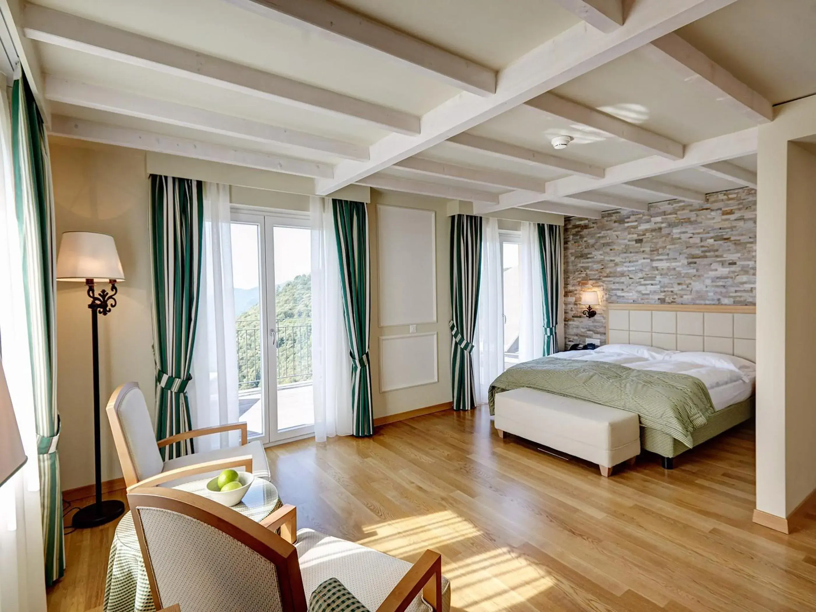 Bedroom in Kurhaus Cademario Hotel & DOT Spa - Ticino Hotels Group