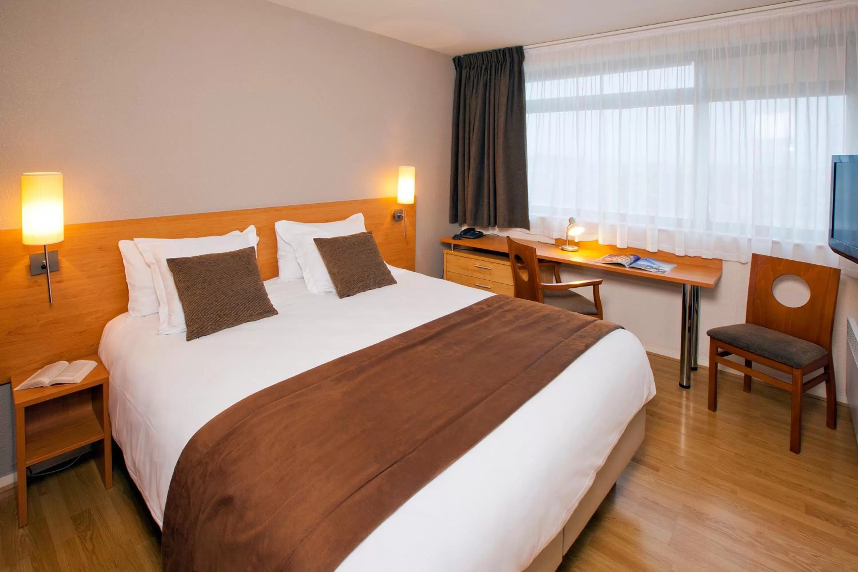 Bedroom, Bed in Séjours & Affaires Rennes de Bretagne