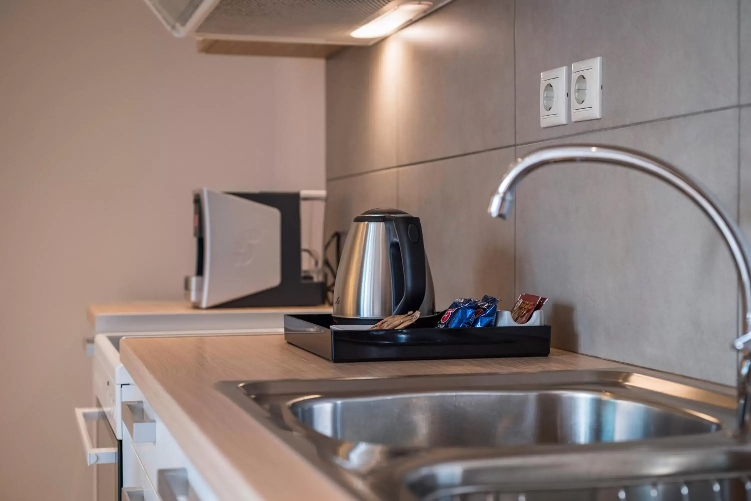 Kitchen or kitchenette in Trianon Luxury Apartments & Suites Kitchen or kitchenette in Trianon Luxury Apartments & Suites