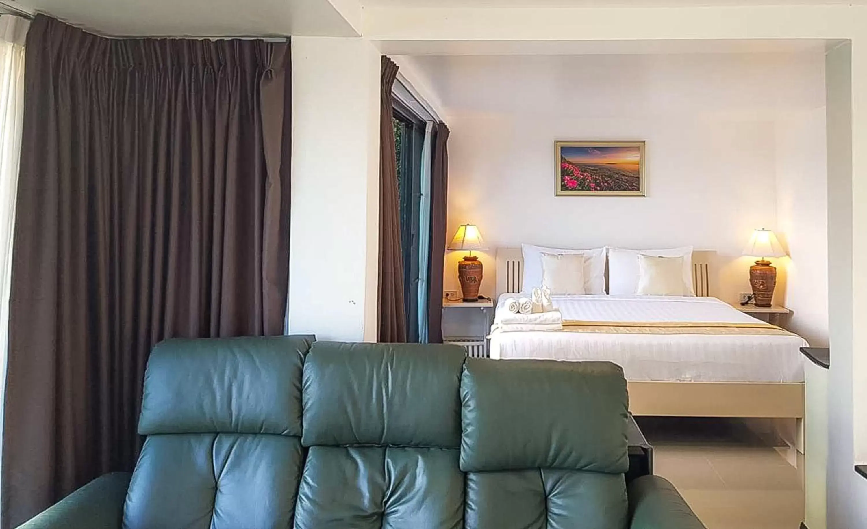 Bed in Phornpailin Riverside Resort