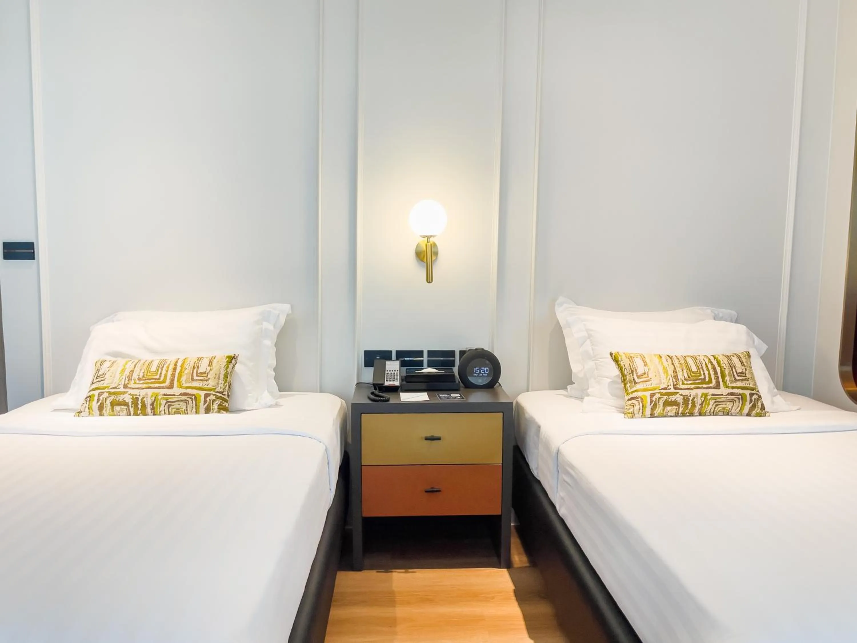 Bed in A-ONE Bangkok Hotel