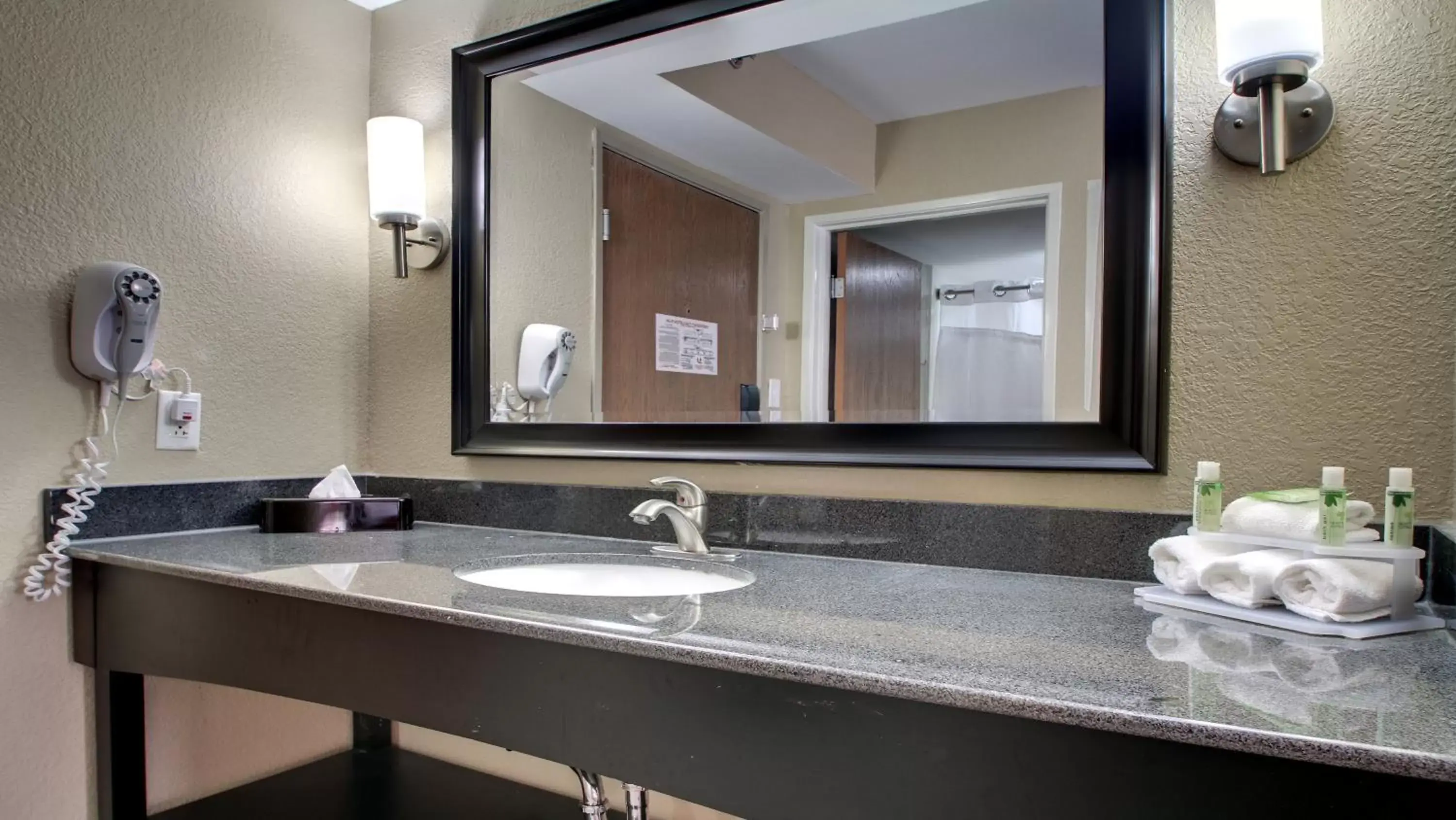 Bathroom in Holiday Inn Express & Suites Jackson Downtown - Coliseum, an IHG Hotel